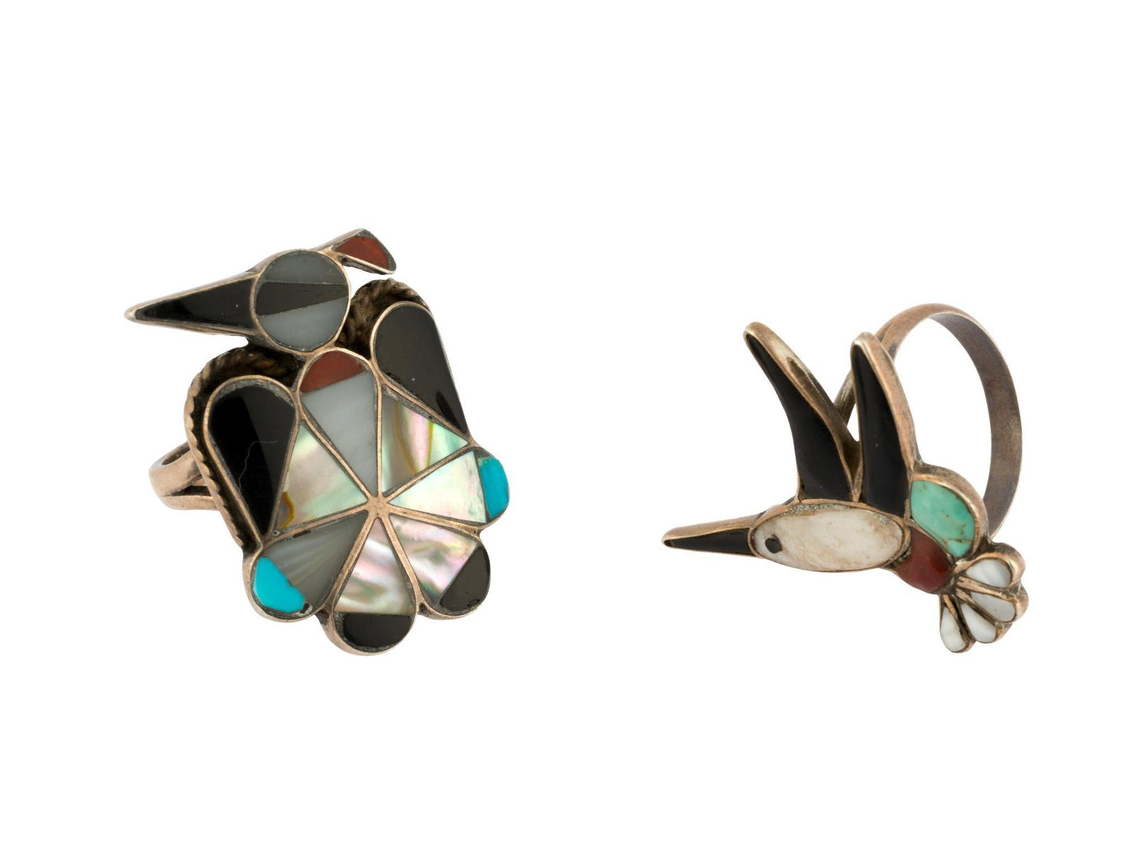 (Modern Era) 2 Sterling Silver Native American Rings: No maker's marks. Includes thunderbird and hummingbird. 3/4" to 1" wide x 1-1/8" long. Size 5.5 to 6.5. Total 0.31 ozt.?