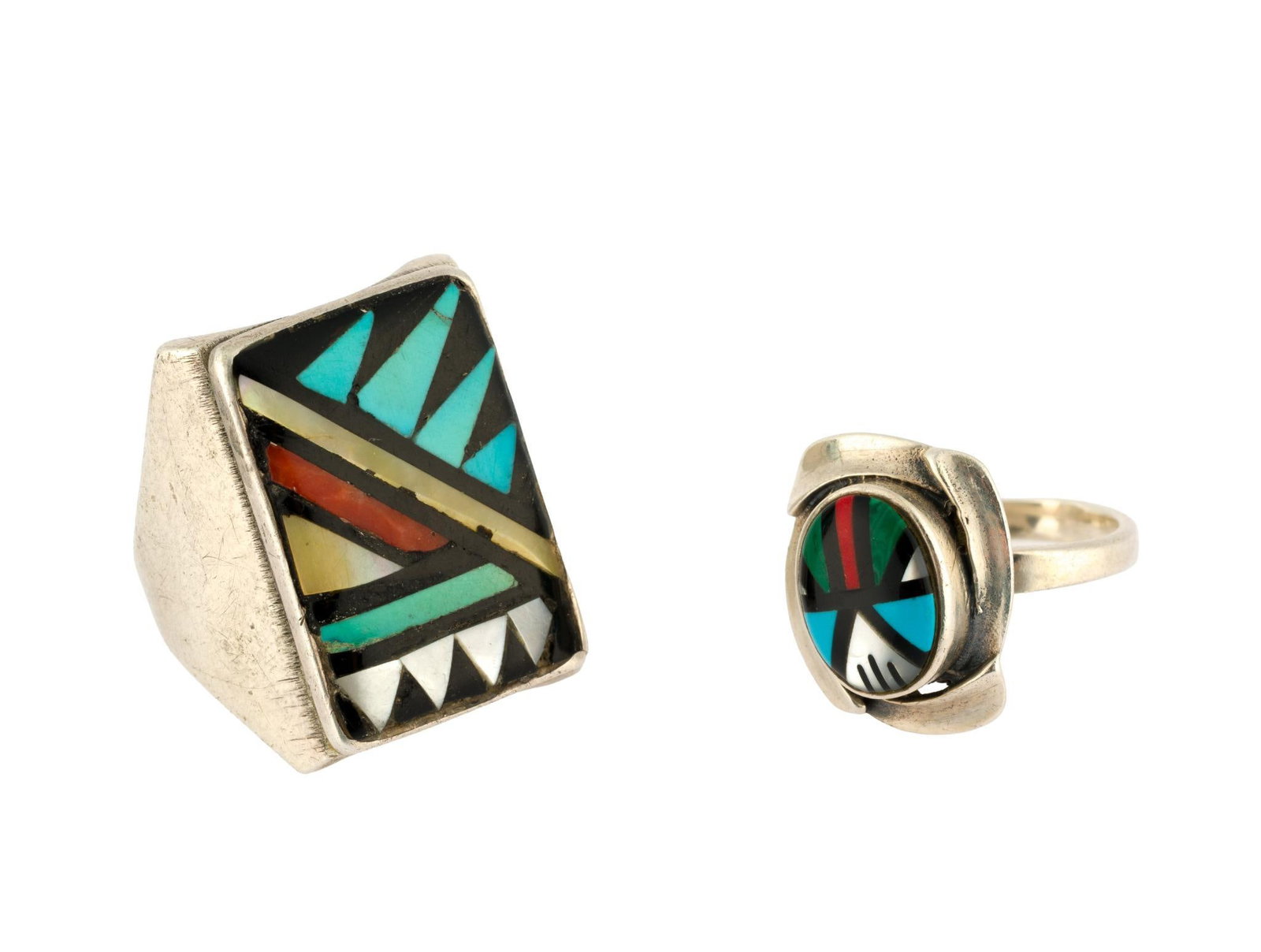 (Modern Era) 2 Native American Sterling Silver Rings: One stamped Zuni. 3/4" to 1" wide x 7/8" to 1-1/8" long. Sizes 5.5 to 11. Total 0.85 ozt.?