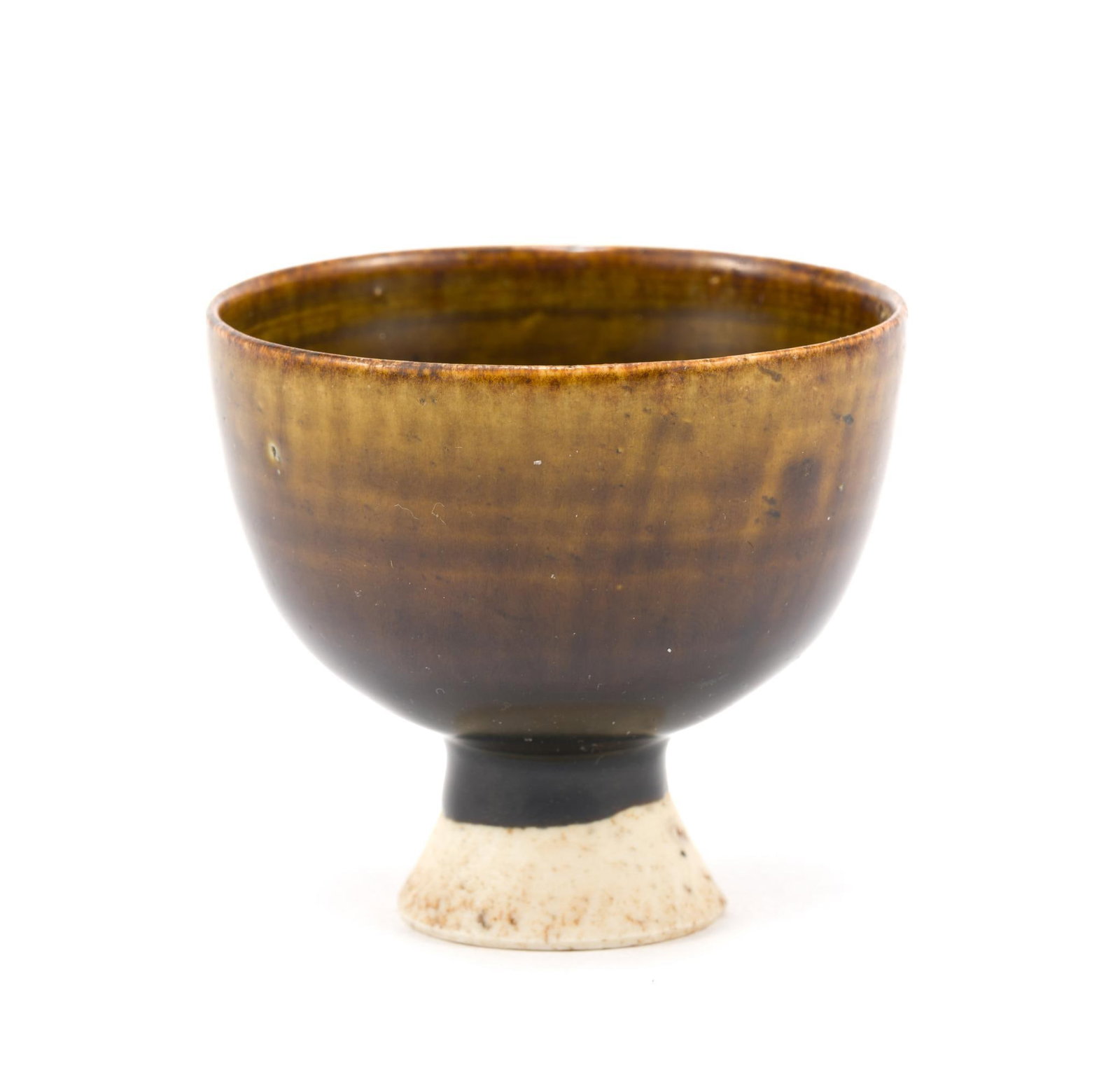 Chinese Stem Cup Song Dynasty: A green-brown and black glazed stem cup 2 1/4" 5.8 cm height by 2 1/2" 6.2 cm diameter. It was purchased in Japan in the 1990's and carries an inventory number a vintage sticker from the Asian ceramic
