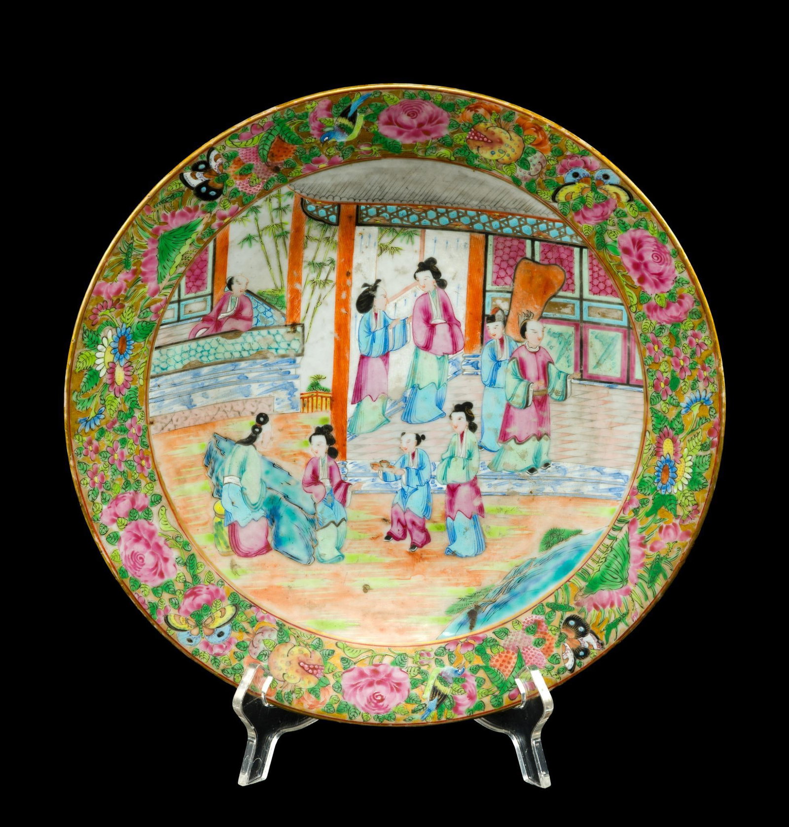 Antique Chinese Famille Rose Porcelain Charger: An 11 1/2" plate from the Qing Dynasty, early to mid 1800's. Decorated with royalty figures and floral with butterflies to the rim. The charger has wear to the gold gilding at the rim but no repairs o
