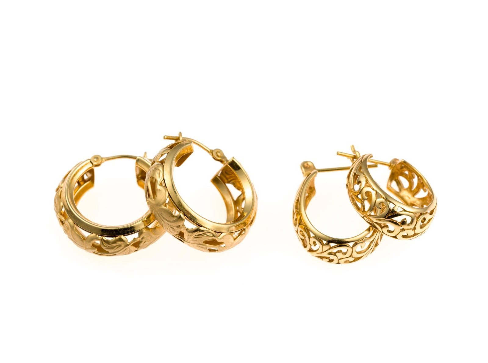 Two Pairs 14K Gold Earrings: Yellow gold hoop huggies for pierced ears. Both pairs of earrings are 5/8" diameter and weigh 6.6 grams total.