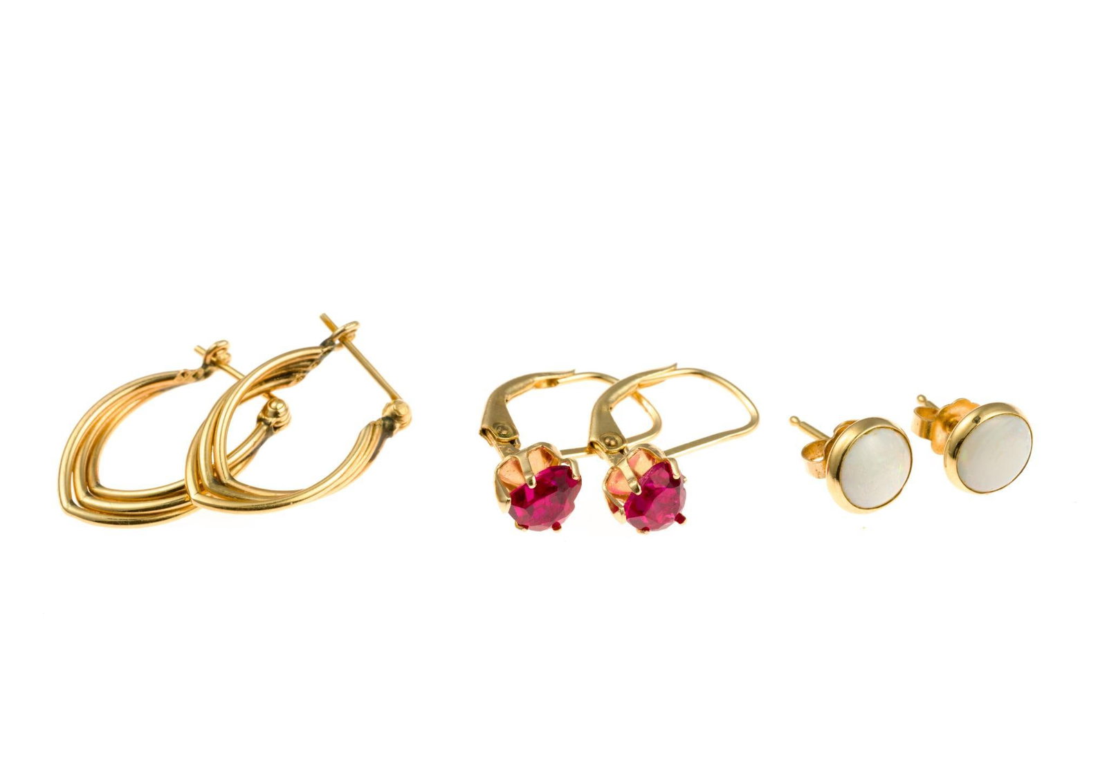 Three Pairs 14K Gold Earrings: All are yellow gold, one with synthetic ruby, one with opal and one gold huggies. Sizes are under 3/4". Total weight is 3.7 grams.