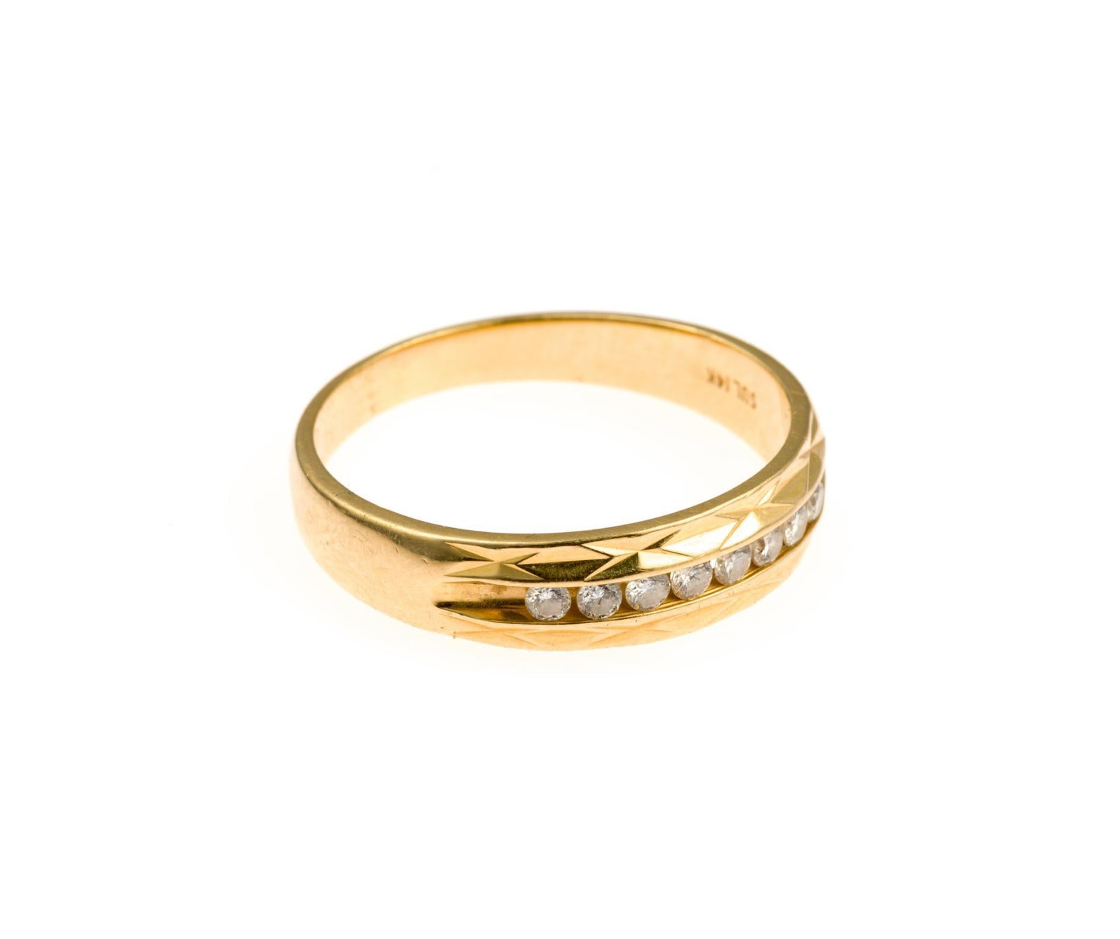 14K Gold and Diamond Band Ring: A size 10 ring with eight channel-set round diamonds. The ring weighs 4.2 grams and the diamonds are 1/4 carat in total.