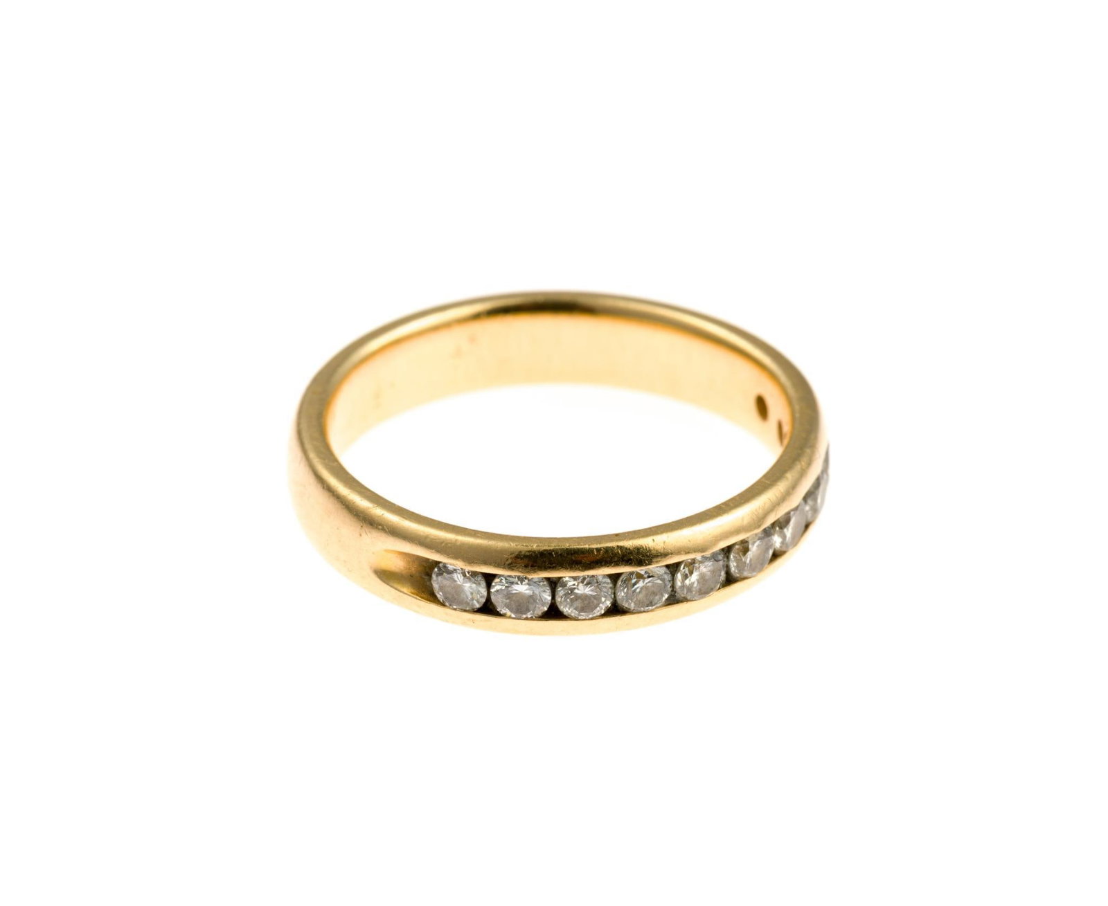 14K Gold and Diamond Band Ring: A size 6 ring with eleven channel-set round diamonds. The ring weighs 3.6 grams and the diamonds are 0.38 carats in total.
