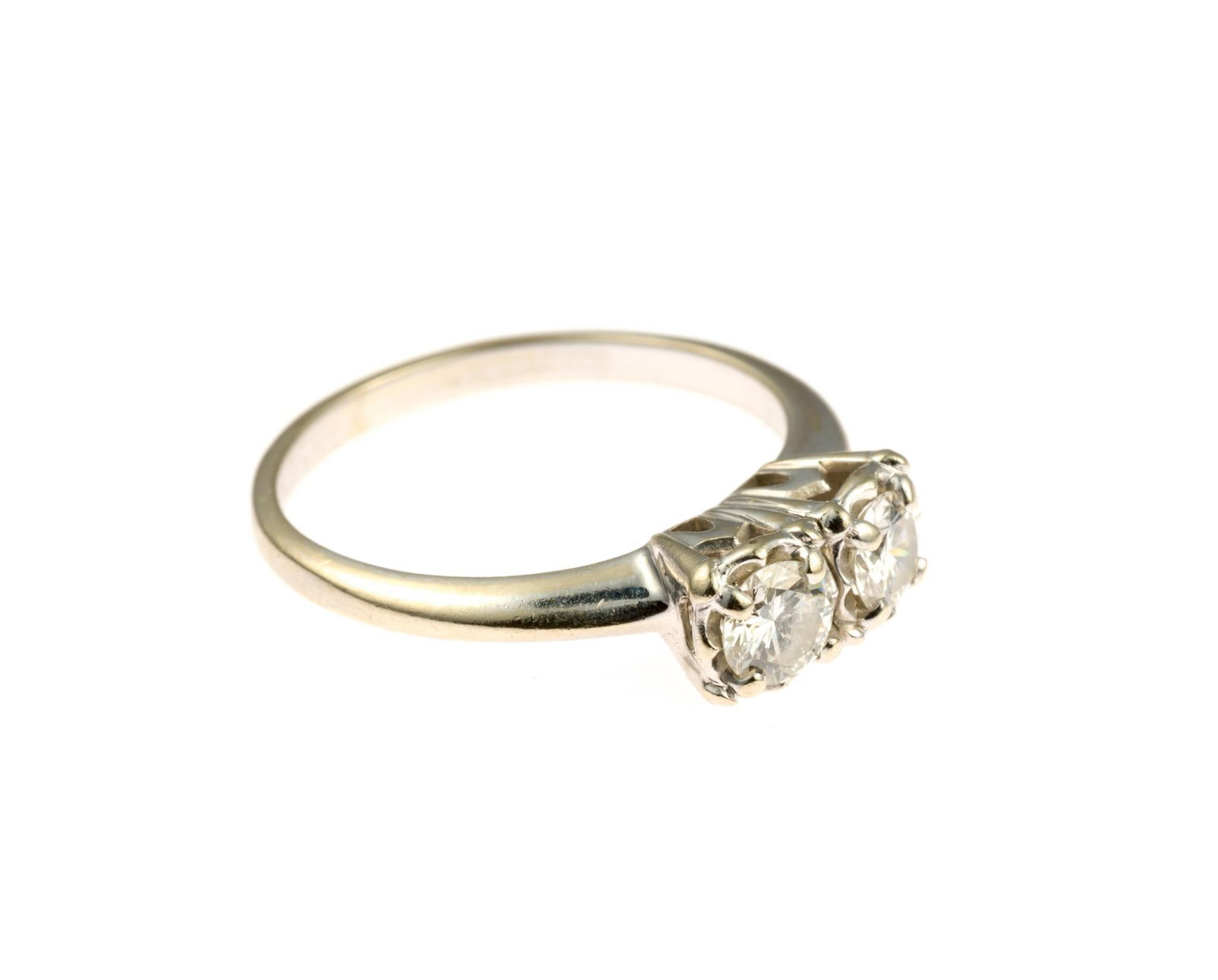 14K Gold and Diamond Duo Ring: A size 7.5 white gold ring with two diamonds that total 0.64 carats. They are in Toi et Moi illusion settings. The diamonds are approximately VS1 Clarity, K-L Color. The ring weighs 3.3 grams.
