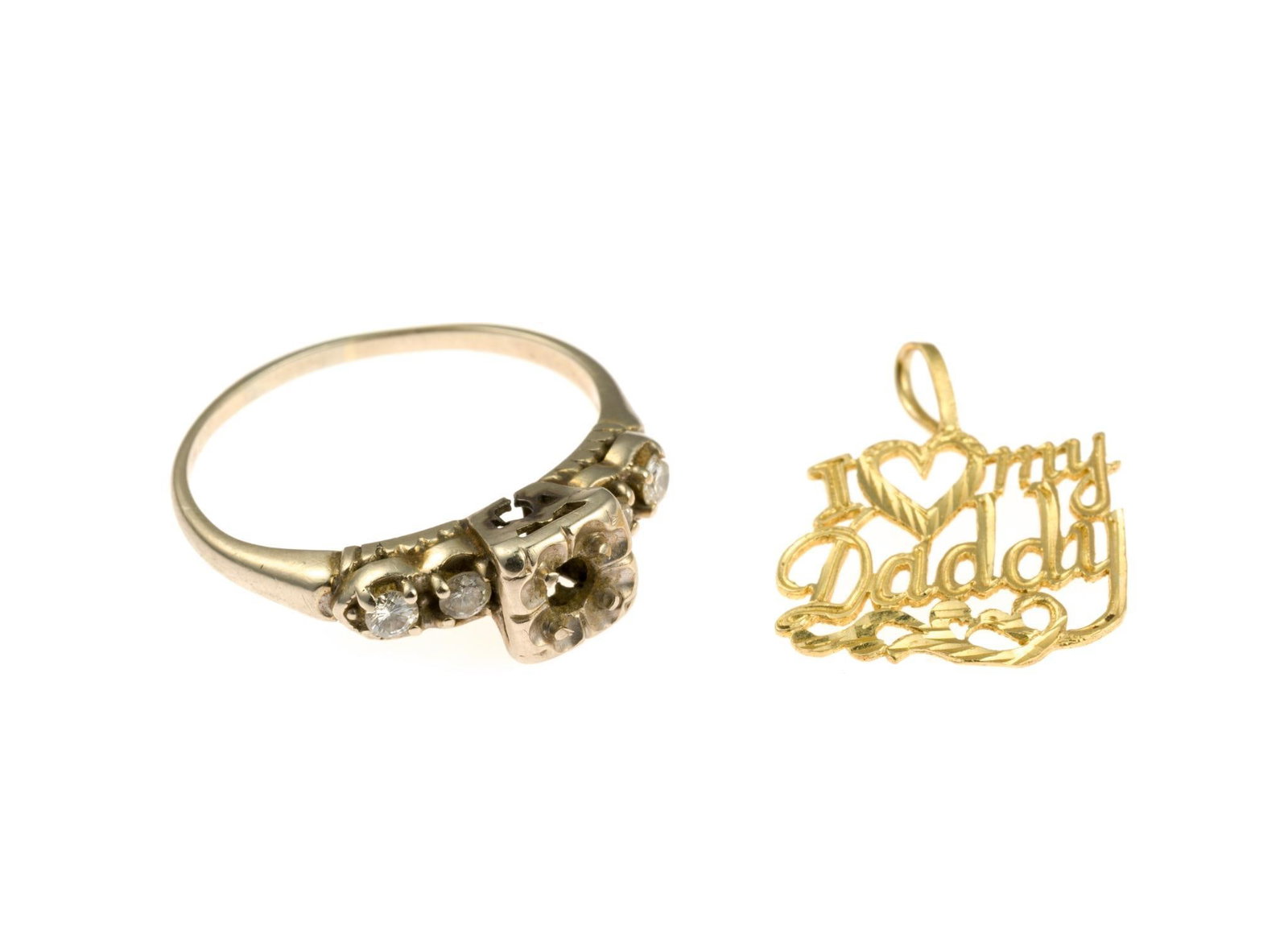Scrap Gold Jewelry: A white gold ring with four diamonds testing 14k gold and a gold pendant marked 14k with total weight of 3.7 grams