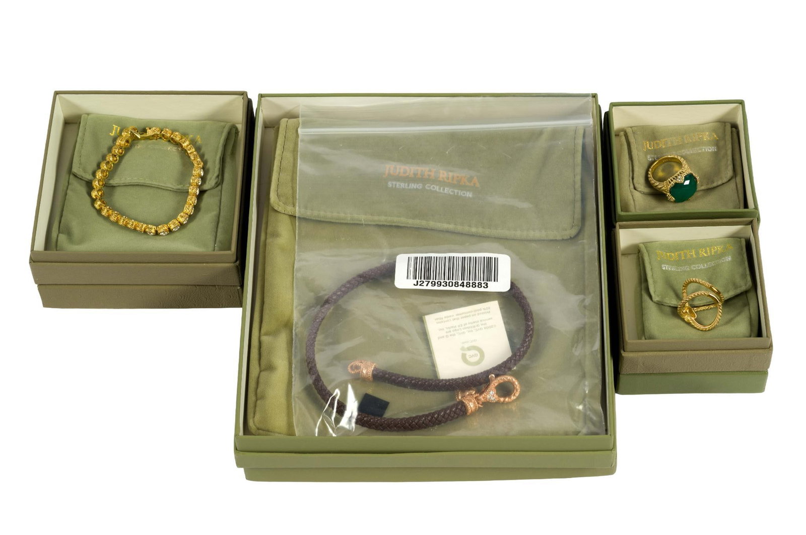 Judith Ripka Sterling Collection Jewelry: Four Judith Ripka vermeil jewelry pieces with original boxes, cloth pouches and papers. All are gold plated sterling silver. There are two size 6 rings, a 7" tennis line bracelet with CZ, and a 15" co