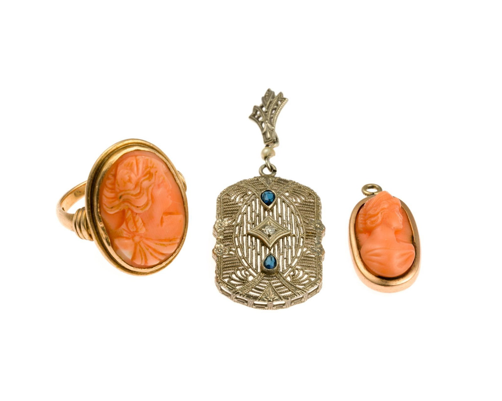 Antiques 14K and 10K Gold Jewelry Incl. Coral Cameos: One filigree pendant with diamond and blue sapphires, marked 10k with weight of 1.8 grams. Coral cameo size 4.5 ring marked 14k and small pendant testing 14k with combined weight of 6.8 grams.
