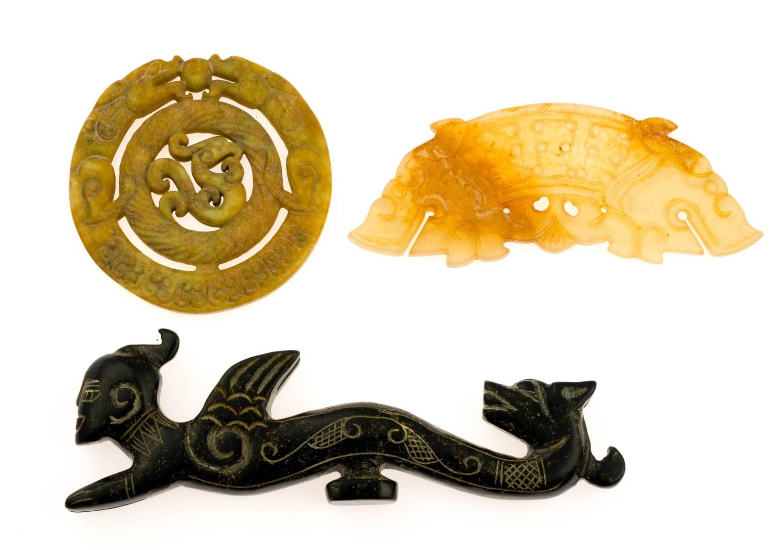 Carved Chinese or Asian Jade Pieces: The lot includes a carved black jade mythical piece 5 1/2" in length.