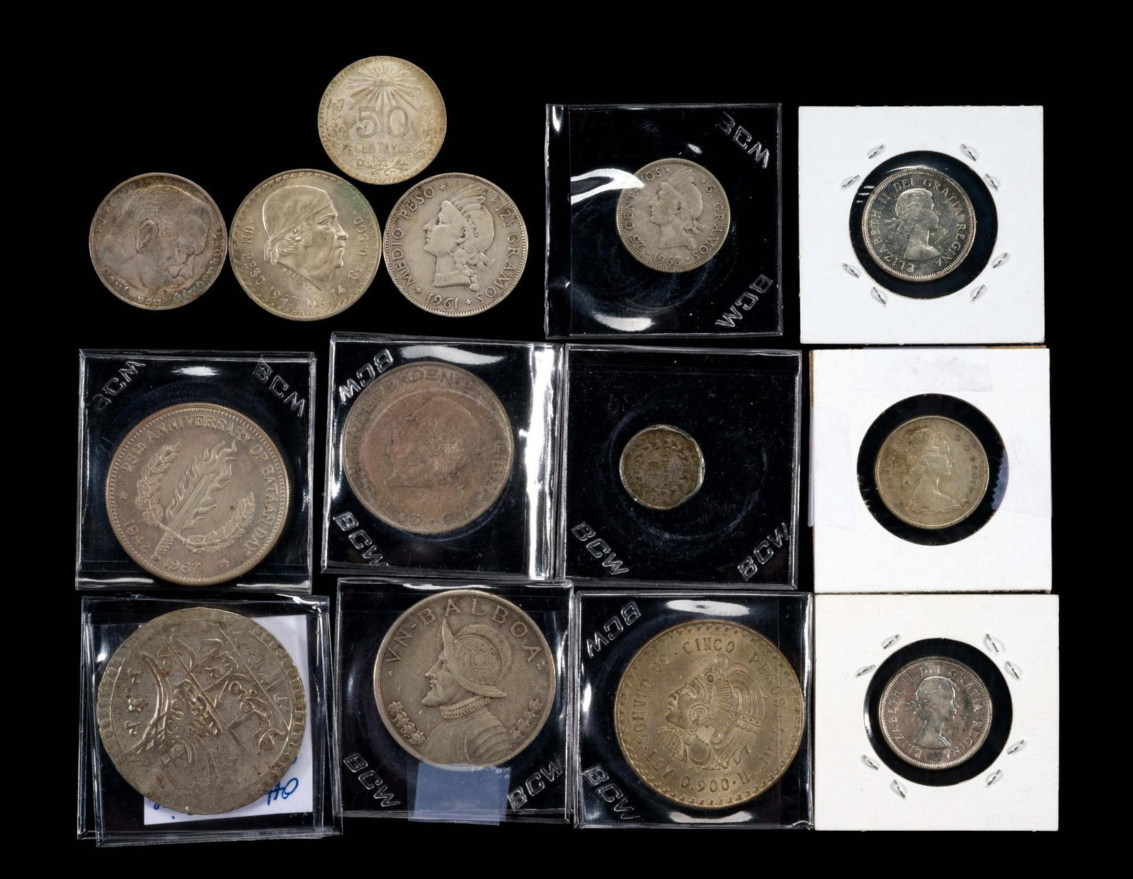 Fourteen Silver World Coins (1 of 2)