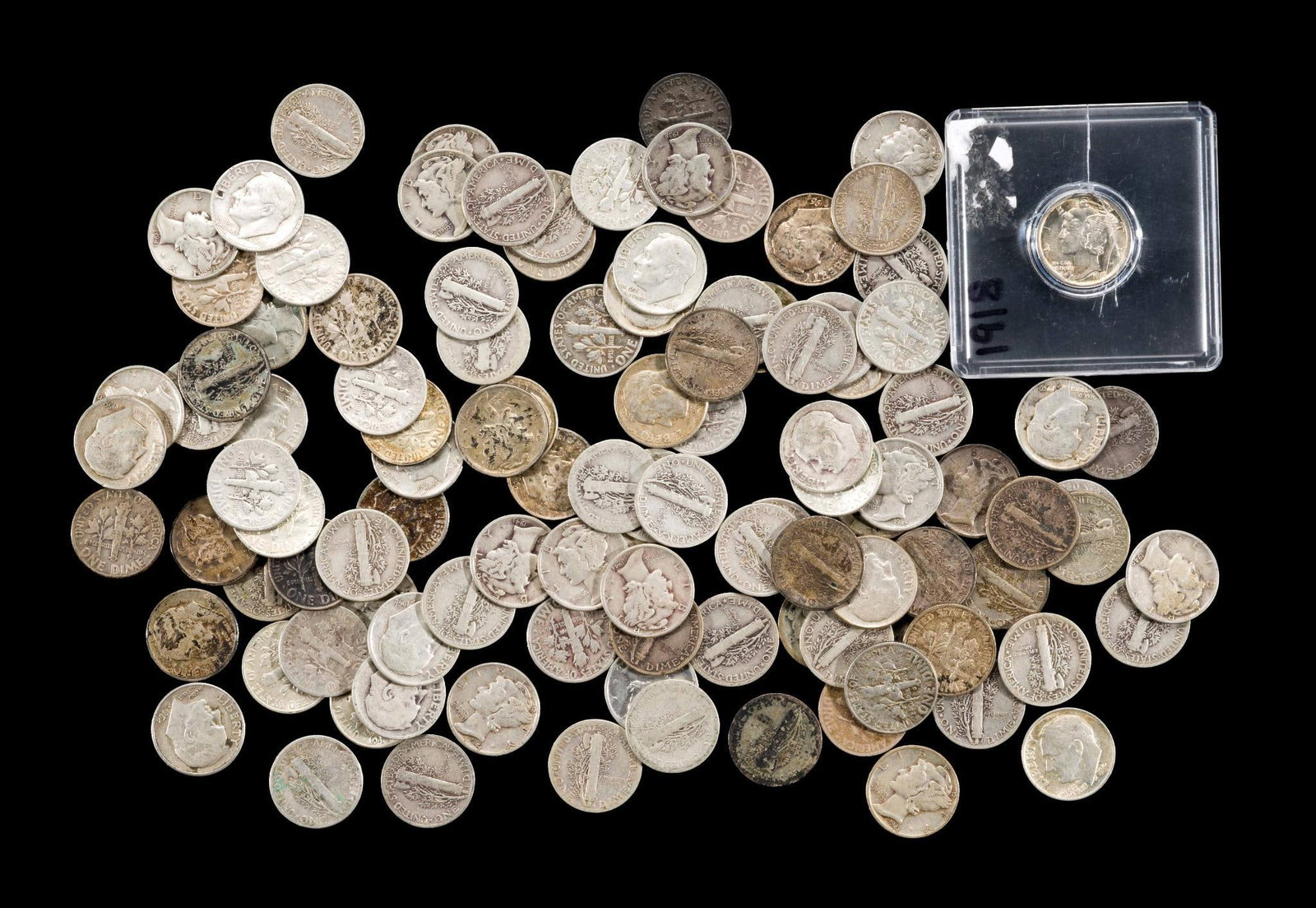 One Hundred And Nine Silver Mercury And Roosevelt Dimes: The majority are Mercury dimes with a few dates in the teens. One Mercury dime, an uncirculated 1918 in an acrylic holder, good surfaces - not showing past cleaning evidence.
