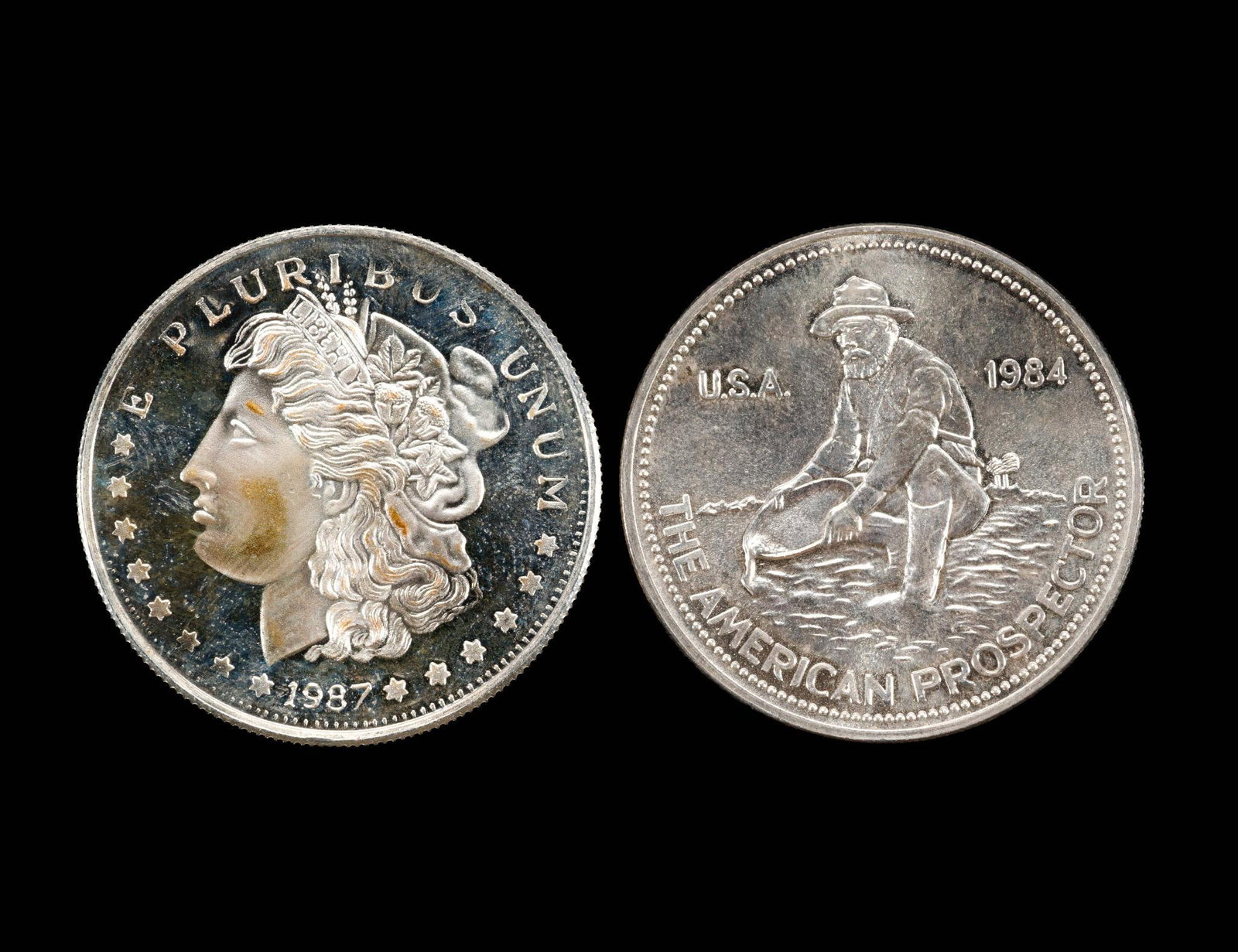 Two Silver Bullion Coins: Each are one troy ounce pure silver.