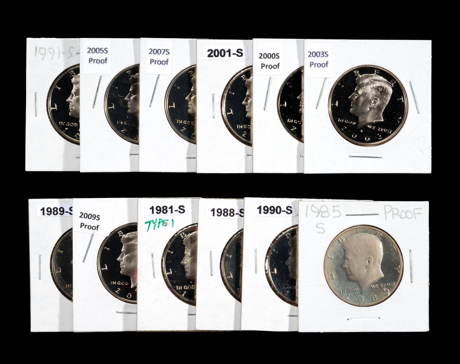 Twelve Proof Kennedy Half Dollars: All are San Francisco mint, very well preserved in cardboard/cellophane holders ranging 1985 through 2007.
