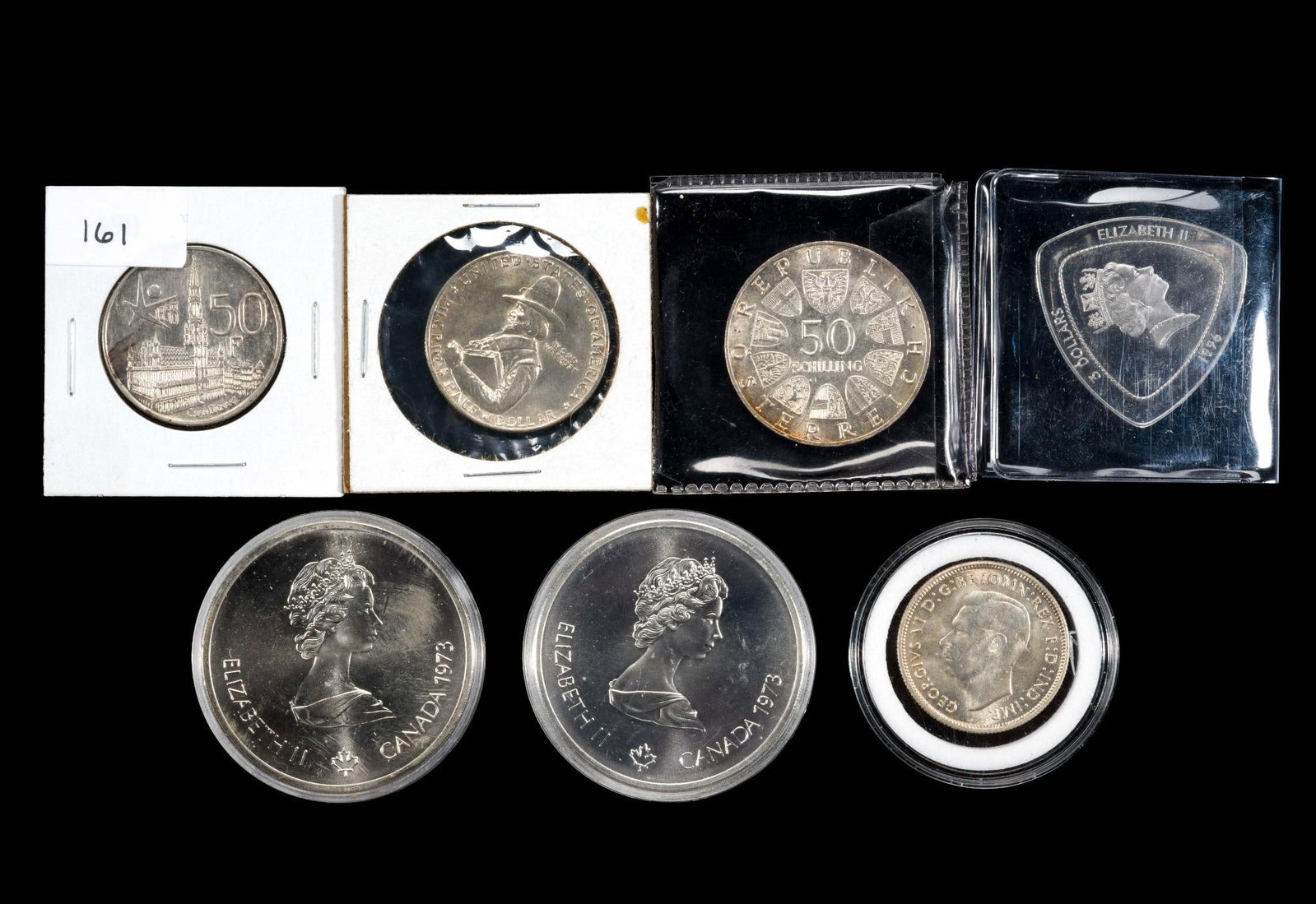 Uncirculated Silver World Coins And US Commemorative Silver Half Dollar (1 of 2)