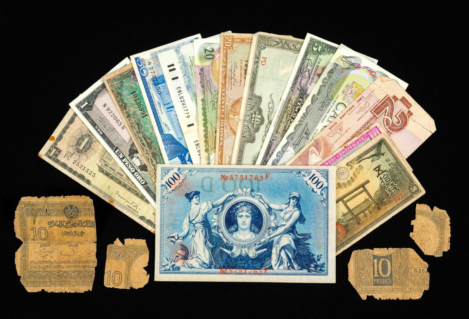 Various World Currency: The lot includes some higher denomination bills with current cash value such as $20 Canada.