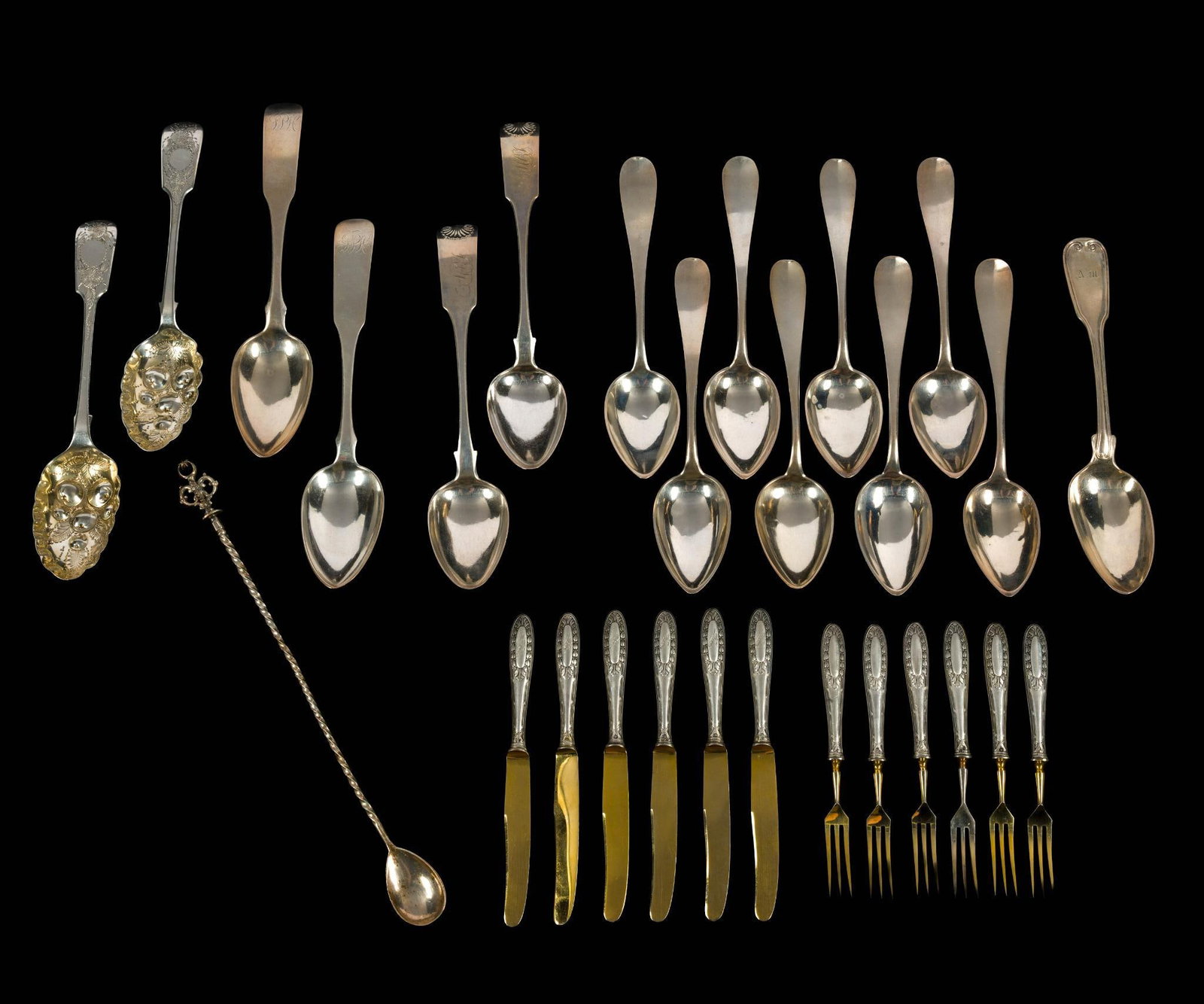 Various Coin Silver Flatware and Sterling Handled Flatware: A set of six each forks and knives with gold plated tines and blades with sterling silver handles. An assortment of coin and otherwise undetermined silver flatware. Please examine hallmarks. The