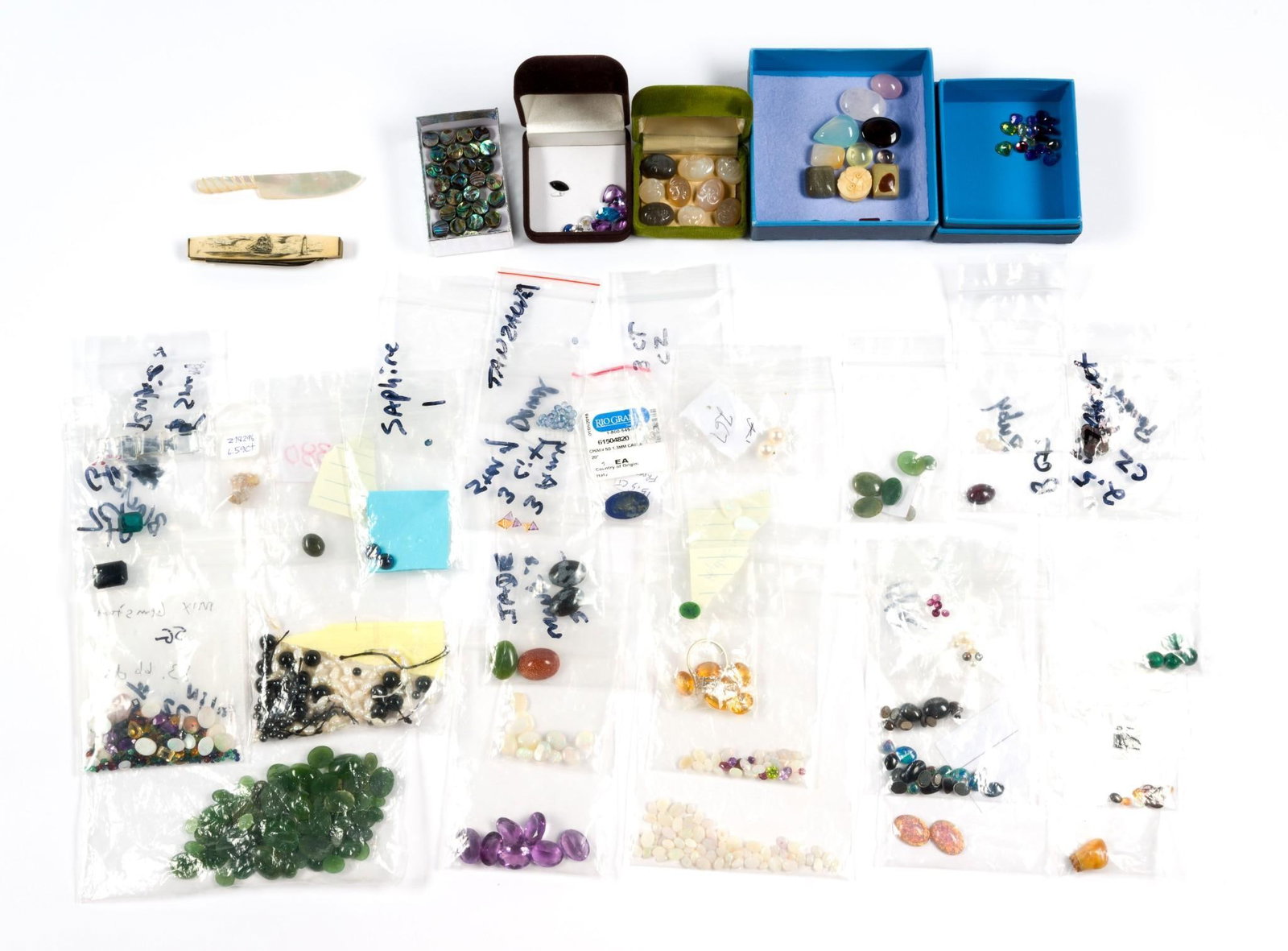 Loose Gemstones Incl. Tanzanite and Amethyst: Stones include many opal gemstones, tanzanite, amethyst citrine, garnet, jade, and more.