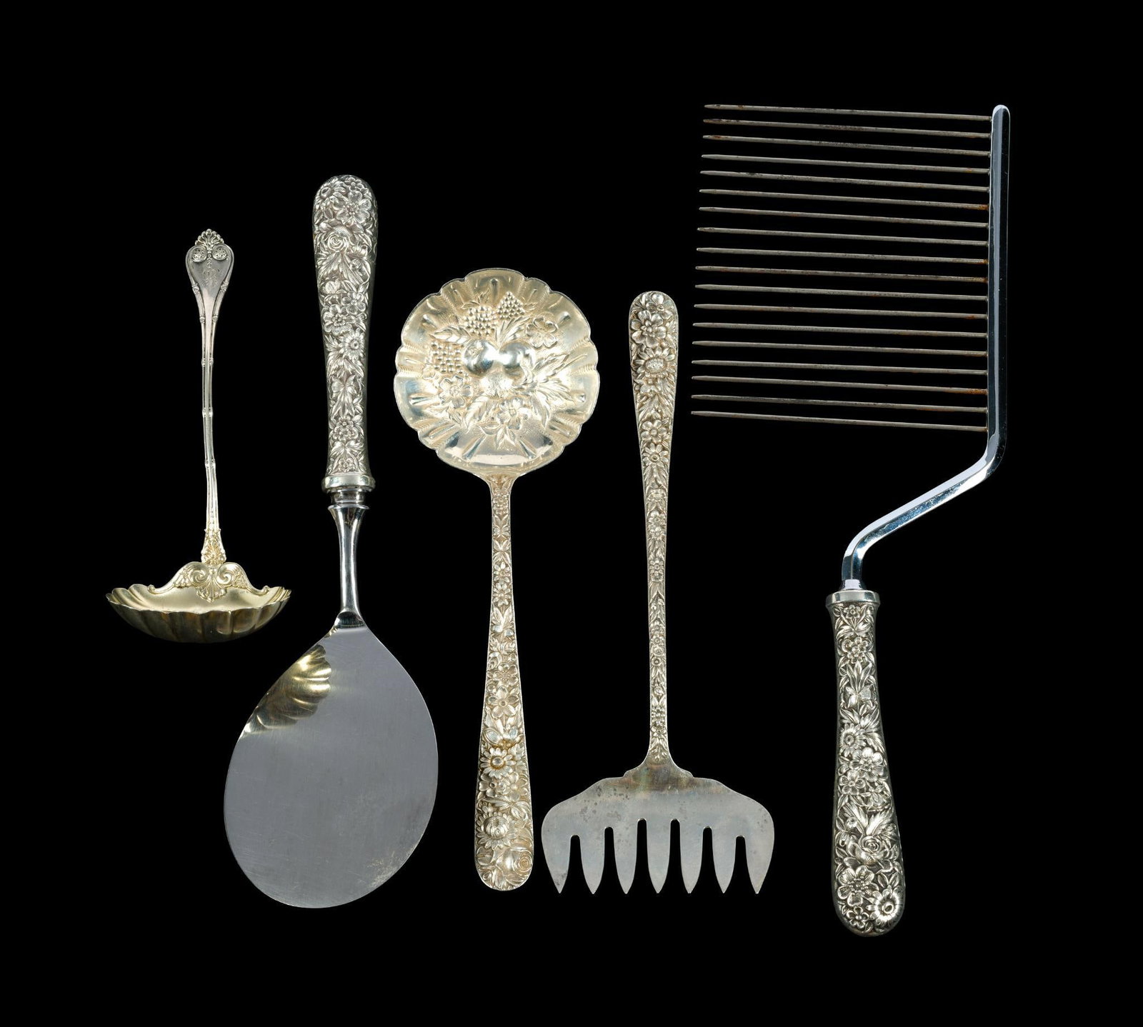 Four Sterling Silver Service Pieces S. Kirk & Son: All four pieces are Repousse pattern, the largest 10 1/2". Two sterling and two sterling handled. The two sterling pieces weigh 3.8 troy ounces.