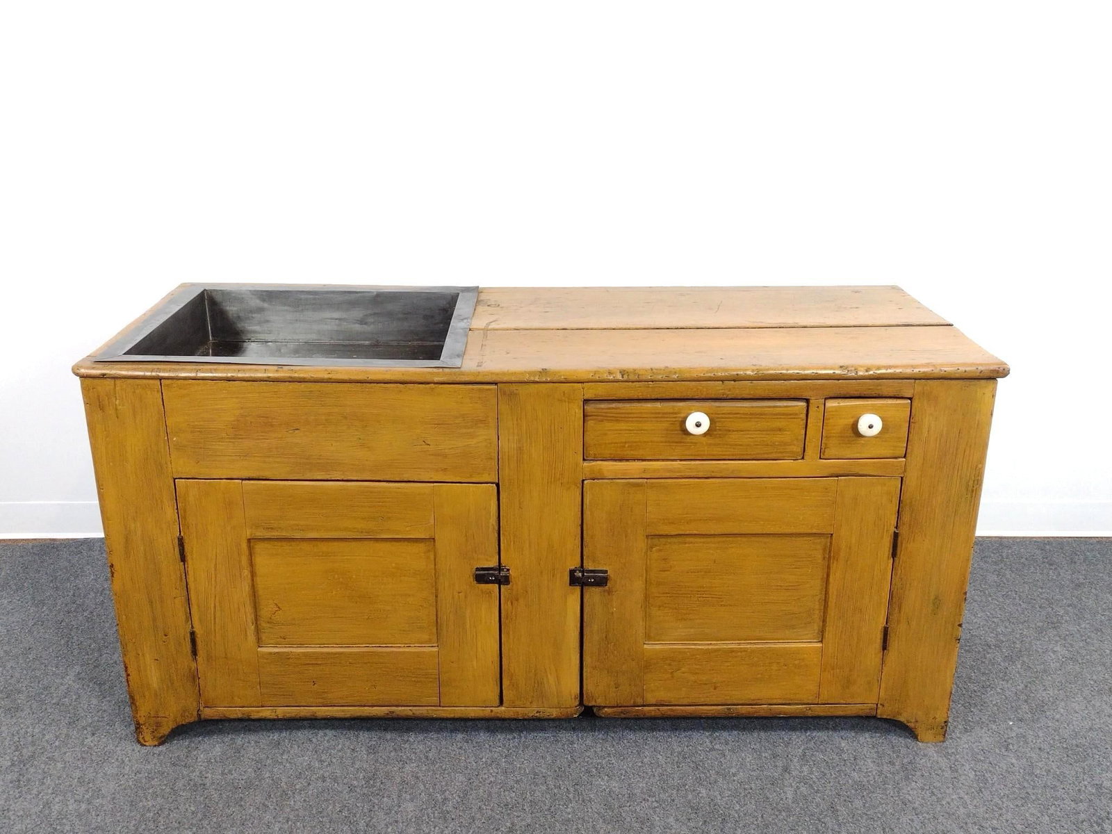 Country Primitive Dry Sink: Painted. Metal insert. 61" wide X 23-1/2" deep X 29-1/2" high. Top and sides have splits.