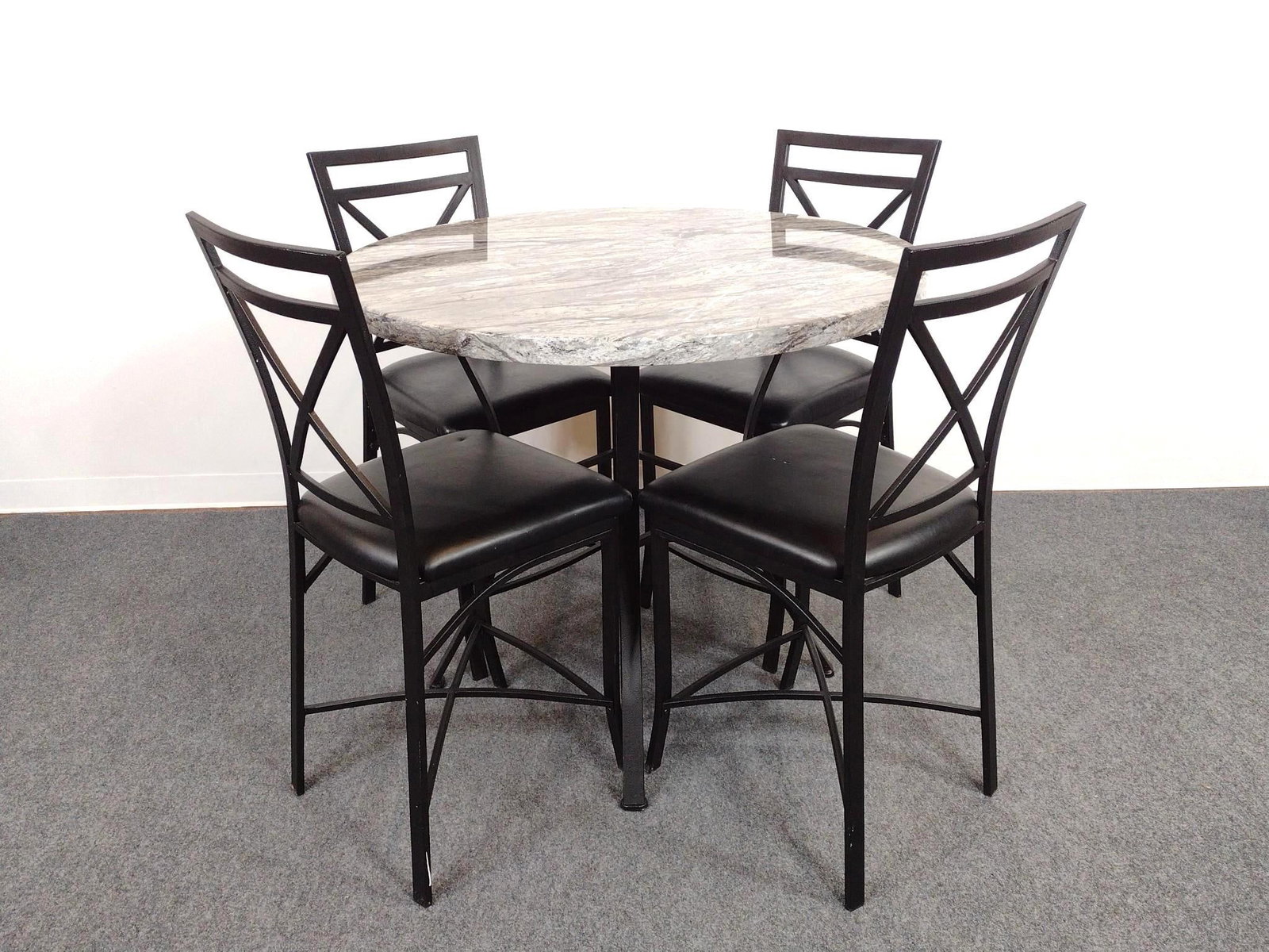 Cramco Inc High Top Table with 4 Metal Chairs: Table 42" diameter X 36" high. Chairs 17-1/2" wide X 19" deep X 42" high. Table top is faux marble. 