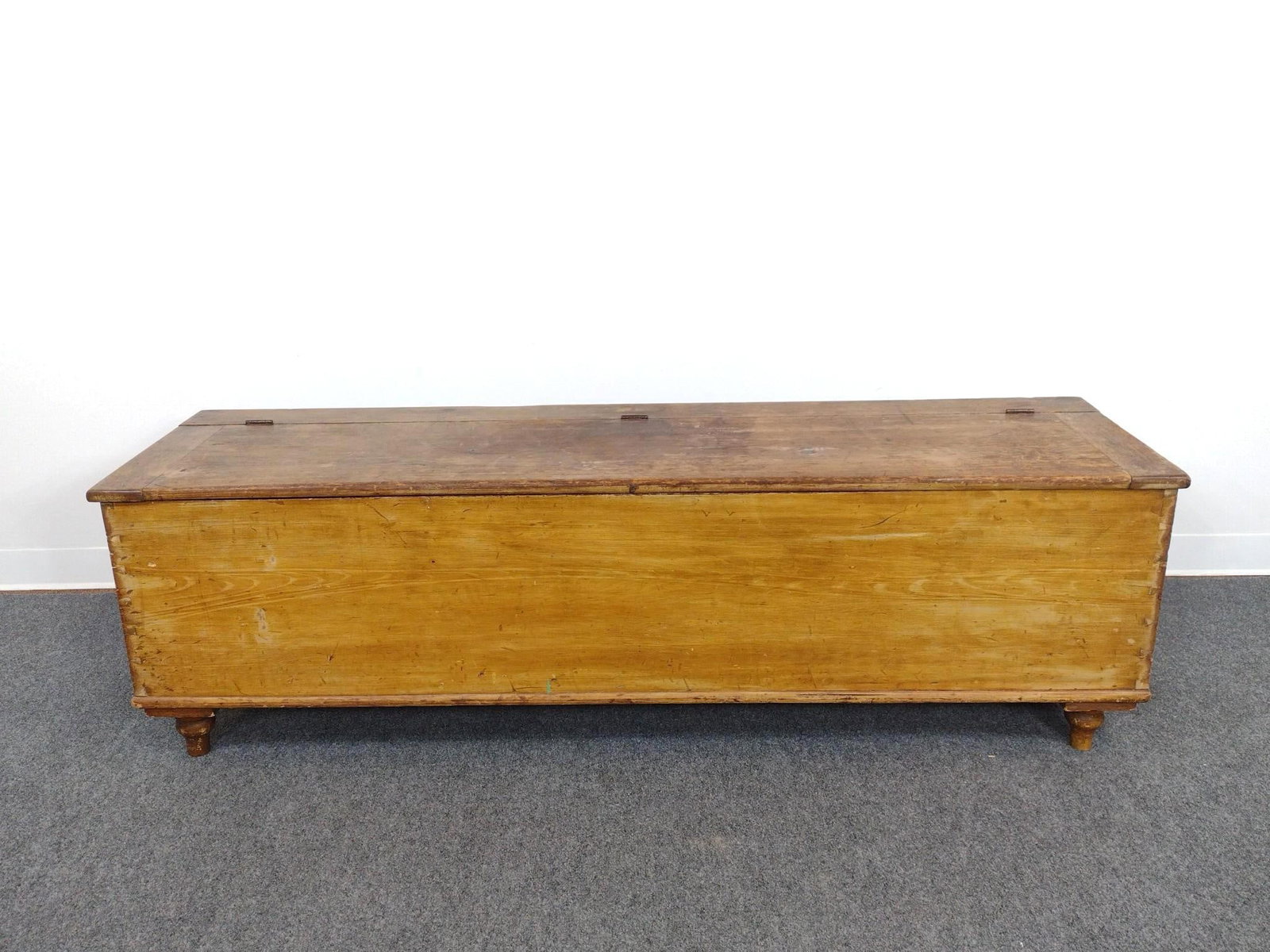 Large Blanket Chest: 67-1/4" wide X 18-1/2" deep X 20-1/2" high. Has wear consistent with age.