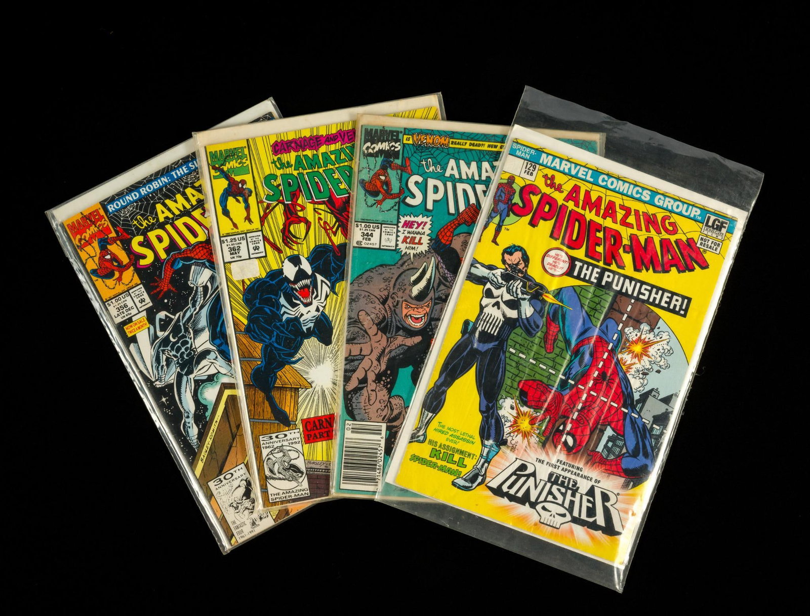 4 Spider Man Marvel Comics: 344, 362, 356, and 129 first appearance of The Punisher. 