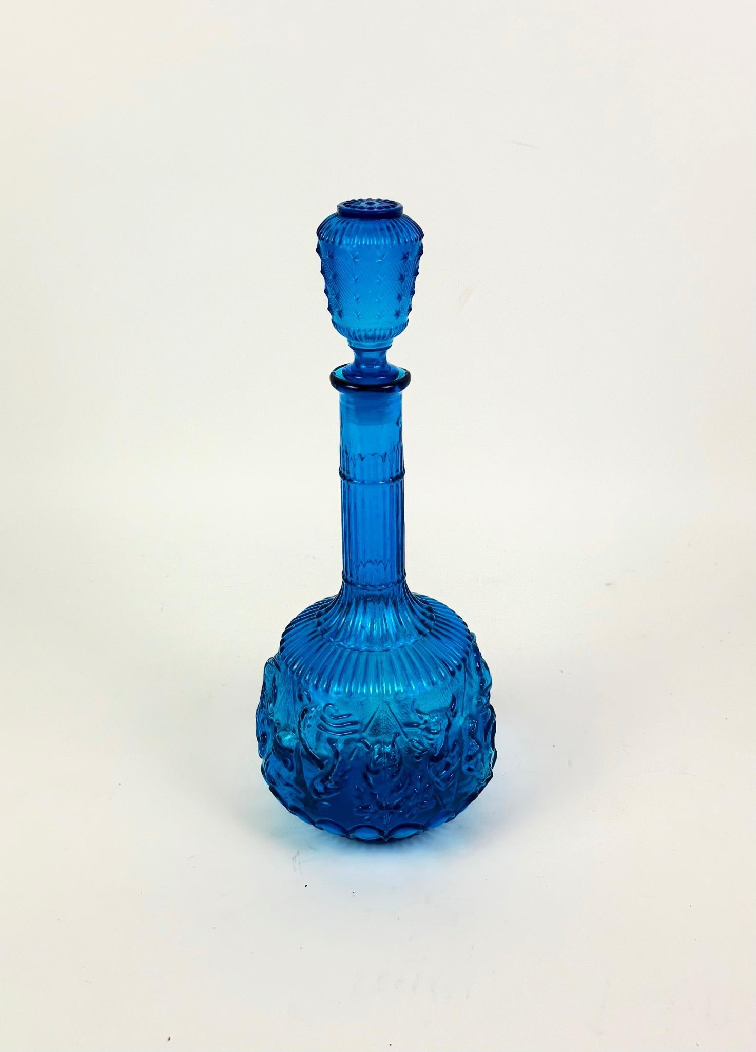 Blue Empoli Glass "Zodiac" Decanter: Bottom marked Made in Italy. 5" wide x 13-1/4" high. 