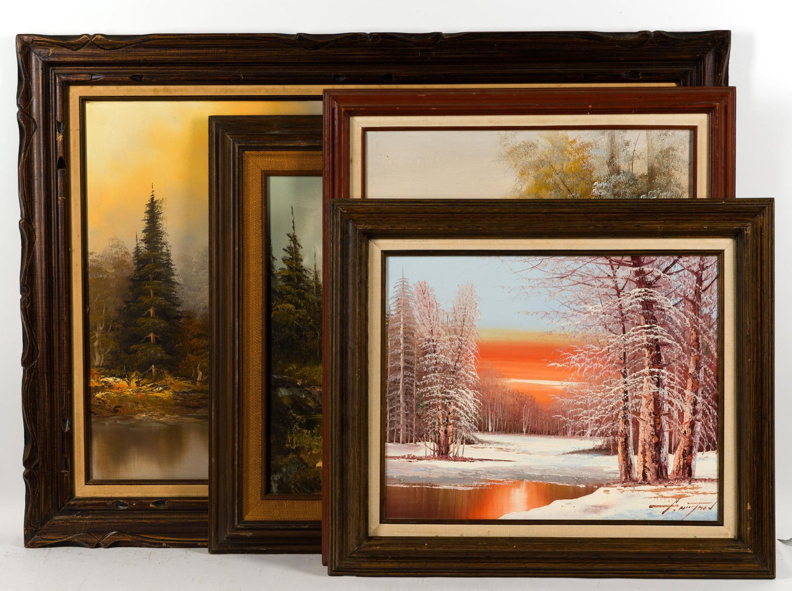 Four Oil On Canvas Landscape Paintings: A group of decor art landscape paintings from approximately the 1960's. The largest is 32" X 44" and smallest 22 1/2" X 26 1/2".
