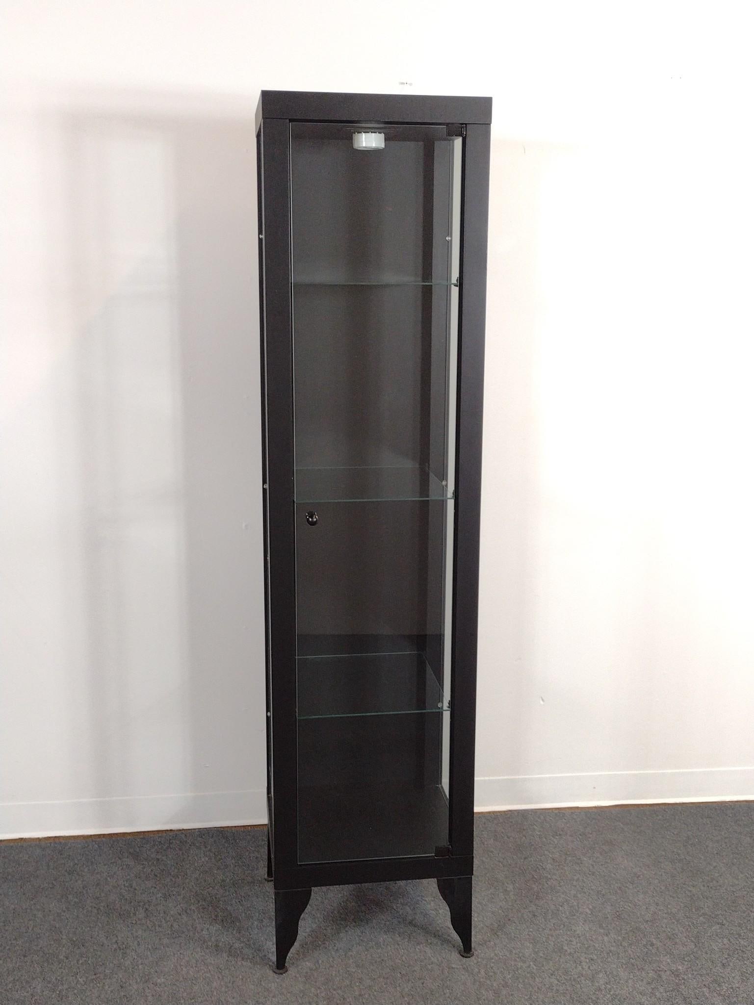 Display Cabinet: 18" wide X 16" deep X 74" high. No manufactures name found.