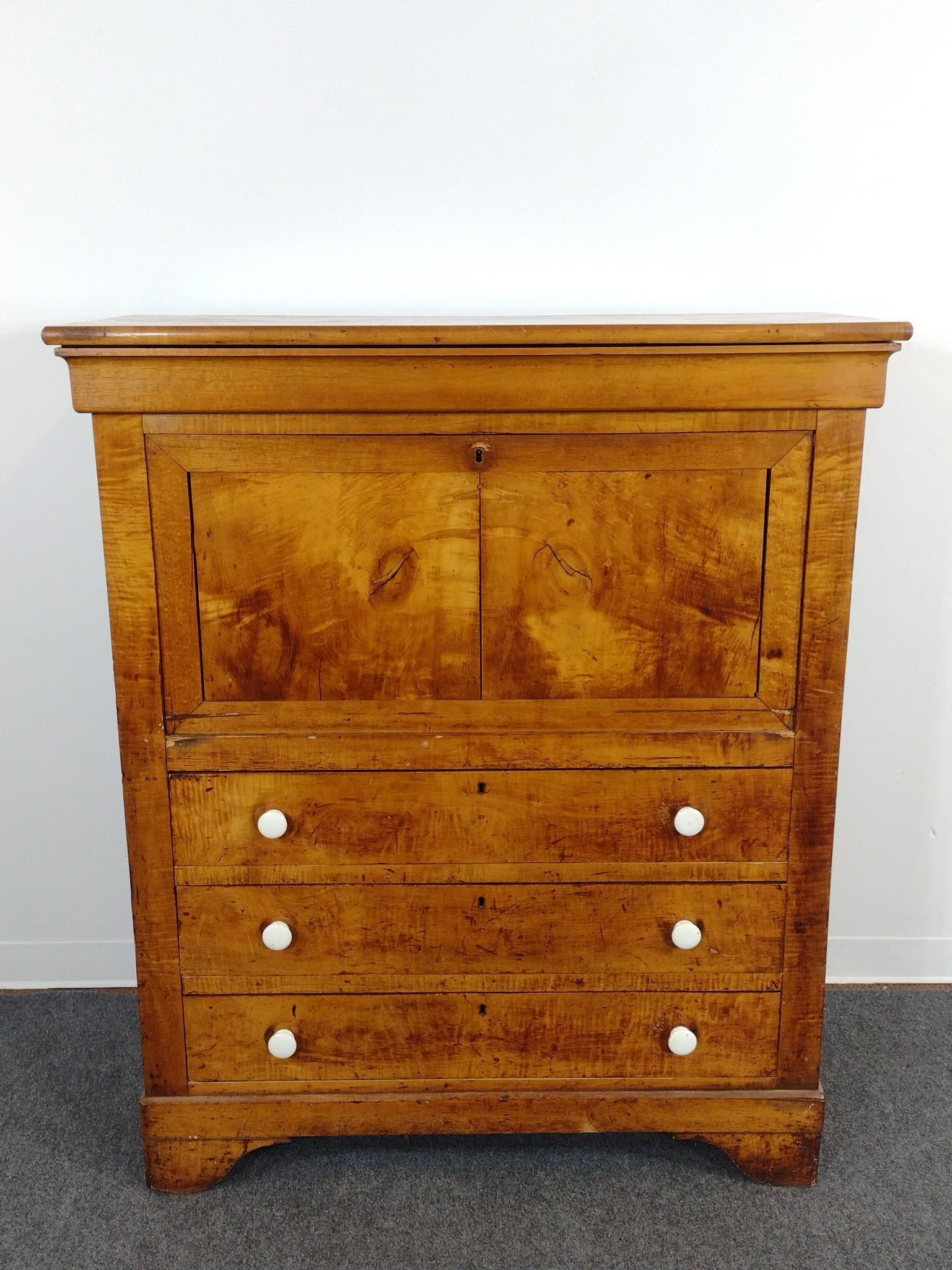 Antique Biedermeier Style Butlers Desk: 19th Century, fall-front with Gothic-arched pigeonholes, and porcelain pulls. 45" wide X 18-3/4" deep X 53-1/2" high. Has some areas of wear and finish loss. 