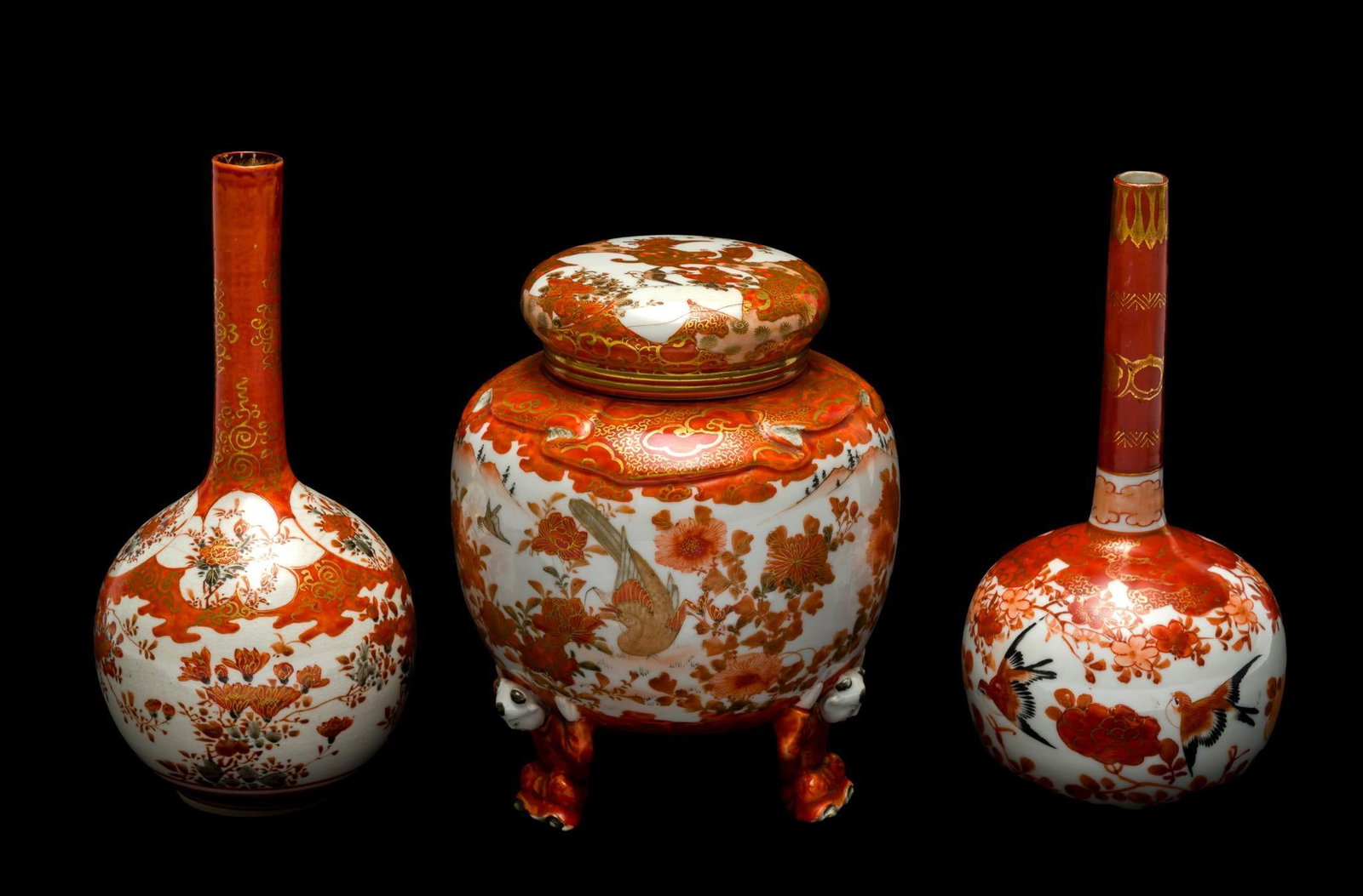 Japanese Kutani Bud Vases & Footed Urn: Traditional red-and-white patterns, possibly Meiji period. Marked on bottom. Ginger jar measures 5 x 5 6-1/4", and vases measure 3-1/2" x 3-1/2" x 7". 