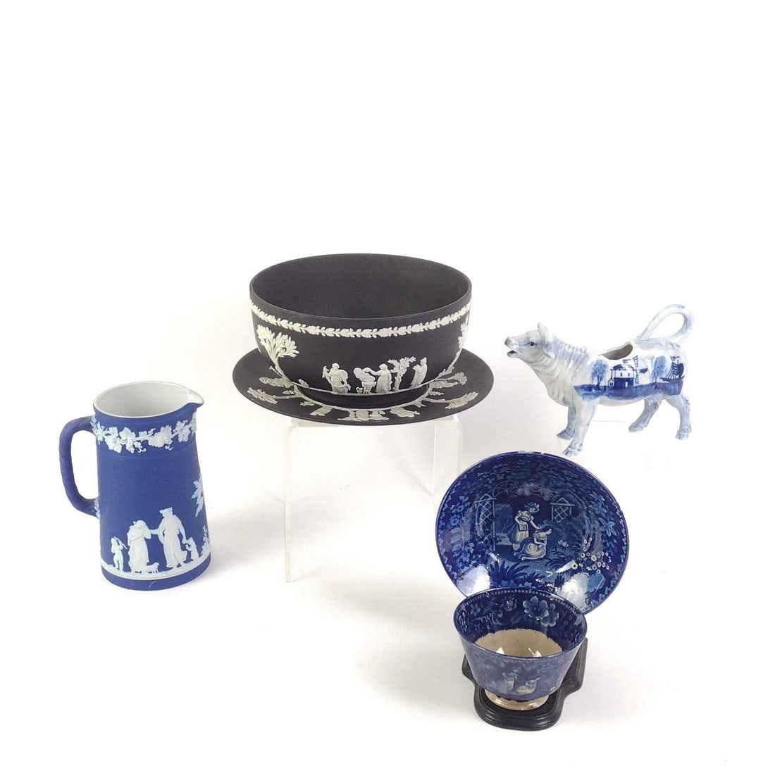 7 Wedgewood Jasperware Incl. Transferware: 1.) 3 pieces of Wedgwood Jasperware, including a black plate & bowl and a blue pitcher. In good condition. 6-1/2 x 5" to 3-3/4 x 7-3/4. 2.) Cup and Saucer Transferware with