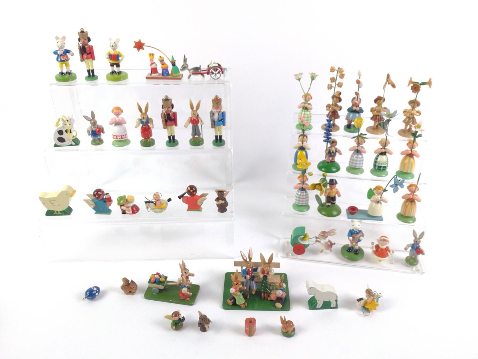 48 Vintage Erzgebirge German & Italian Figurines: Includes German folk figurines, bunnies, and other animals. Most are marked on the bottom with "Made in Germany" and "Made in Italy." Traditionally, these figurines were hand-turned and hand-painted.