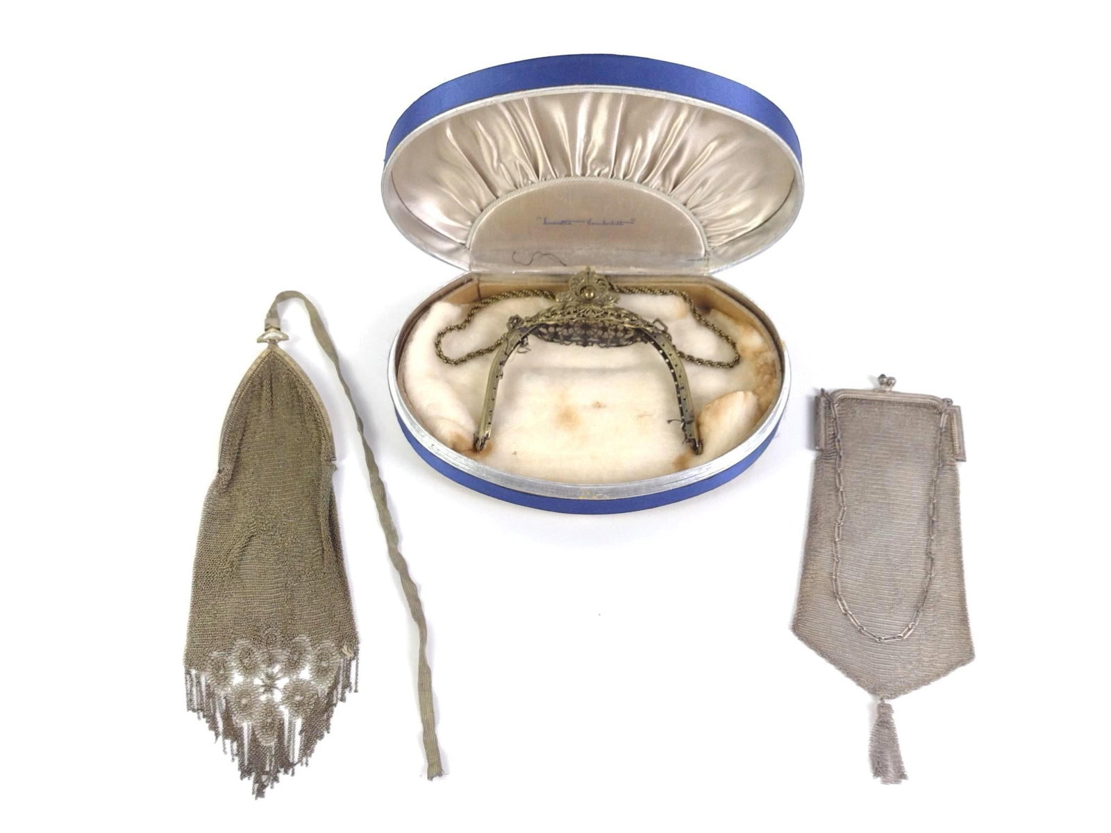 2 Whiting & Davis Co. Metal Mesh Flapper Purses: Also includes a gilded purse handle and clasps, but the back portion is missing. Also includes a Whiting & Davis gold purse and a Whiting & Davis metal mesh purse. Largest box measures 8" x 5" x 2"