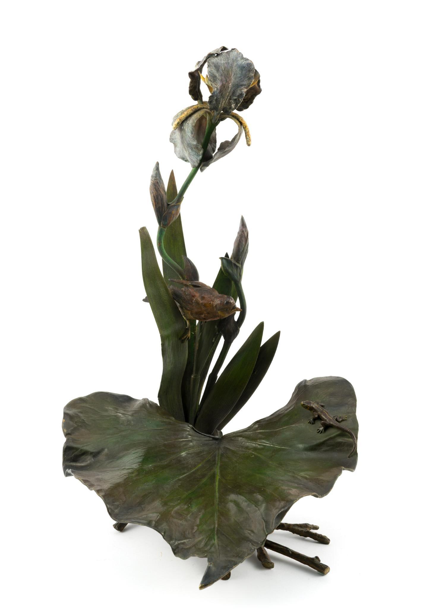 Austrian Art Nouveau Bergmann Bronze Iris Sculpture: Finely cast and cold-painted Austrian bronze sculpture depicting a blooming iris with a perched songbird and lizard on a large leaf base. Bears Franz Xavier Bergman's Vienna foundry mark. Measures 10