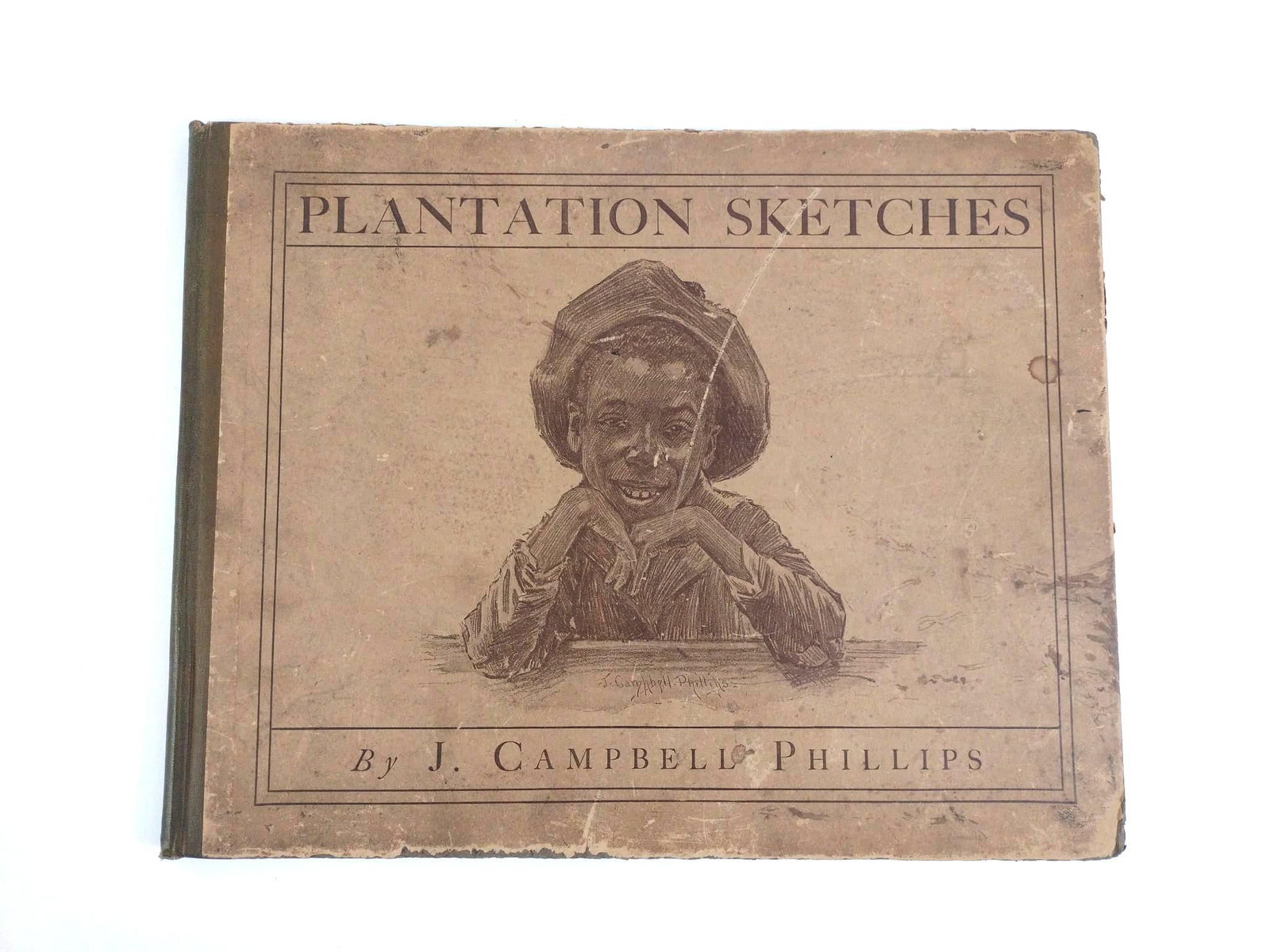 J. Campbell Phillips "Plantation Sketches" 1899: Published in New York: R.H. Russell in 1899. Small folio, [2 blank], 29 plates. Publisher's boards with vignette title on cover. Cloth spine with paper title label. Twenty-nine plates of J.
