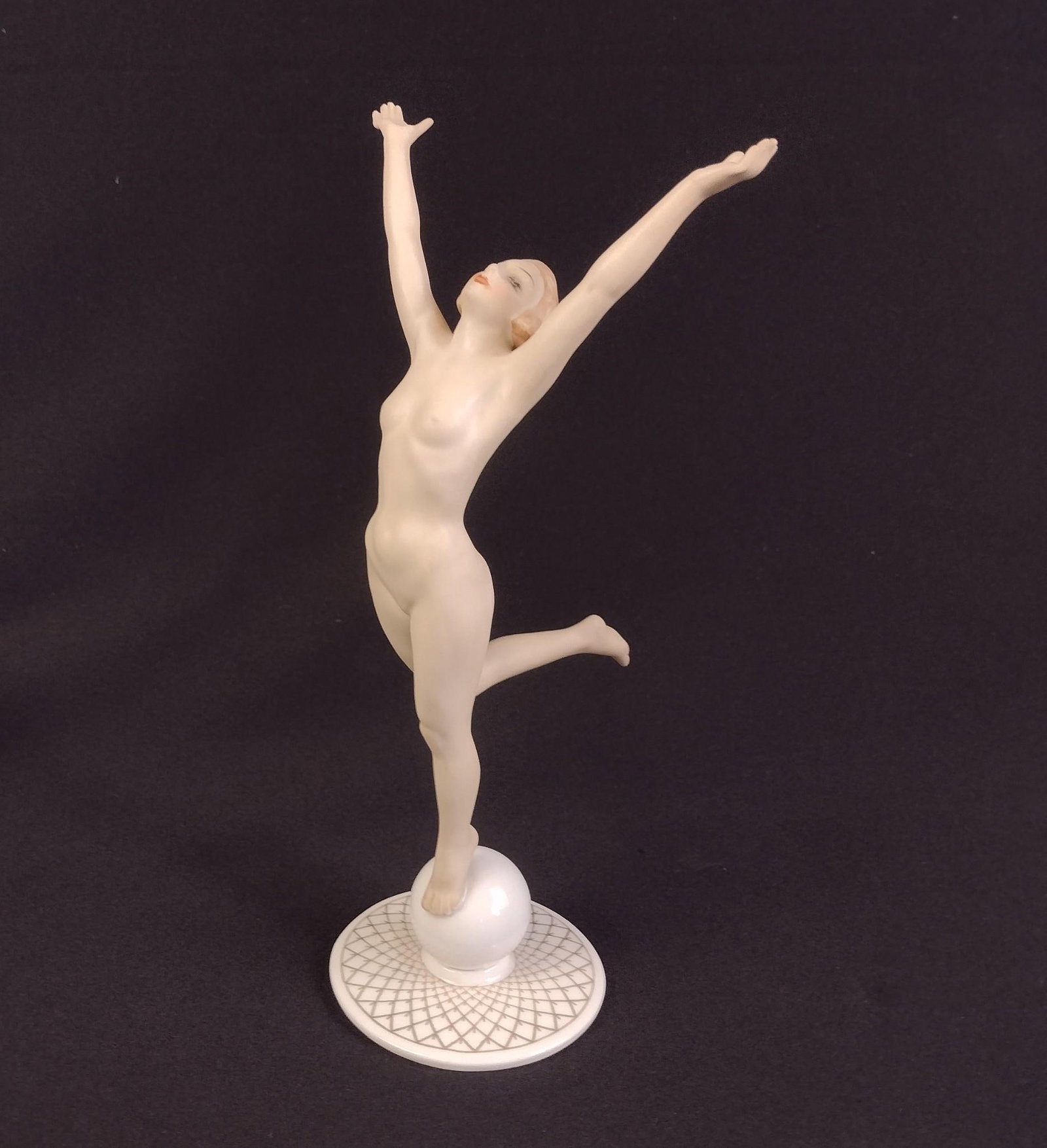 Art Deco Hutschenreuther "Sonnenkind" Porcelain Figurine: Also known as "Son Child," this piece was designed by Karl Tutter in the 1930's. Measures 2-3/4" x 2-3/4" x 9". 