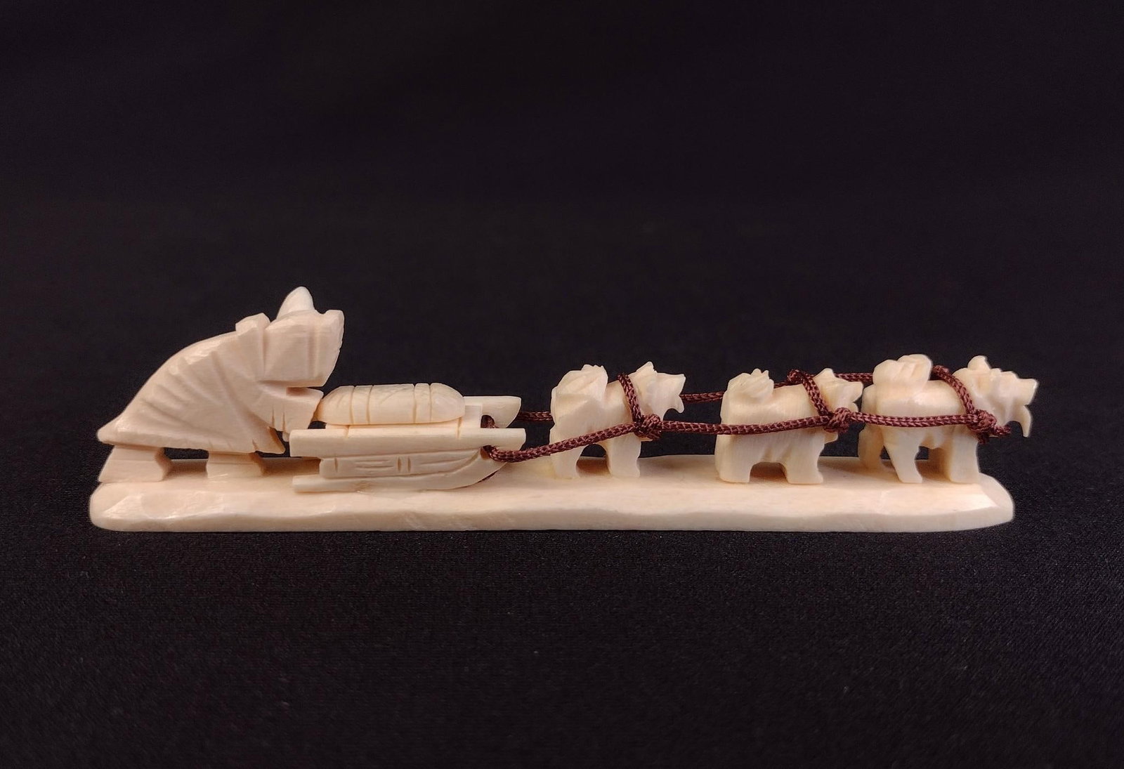Inuit Bone Carving Of Sled & Dogs: Circa mid-century. 4" long. Excellent condition. 