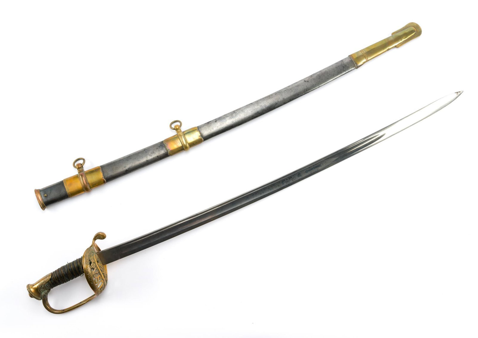 Late 19th C U.S. Army Officer's Saber: Late 19th Century U.S. Army Officer's Saber, having a gilt brass hilt with pierced "U.S." guard, wire-wrapped fishskin grip, etched steel blade, and steel scabbard with brass mounts. 