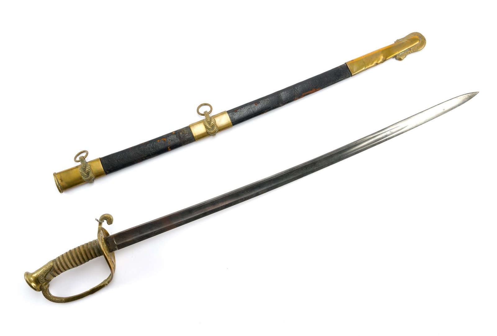 Late 19th C U.S. Army Officer's Sword: Late 19th Century U.S. Army Officer's Sword, having a gilt brass hilt with pierced "U.S." guard, eagle-head quillon, fishskin grip with wire wrap, etched steel blade, and leather-covered steel