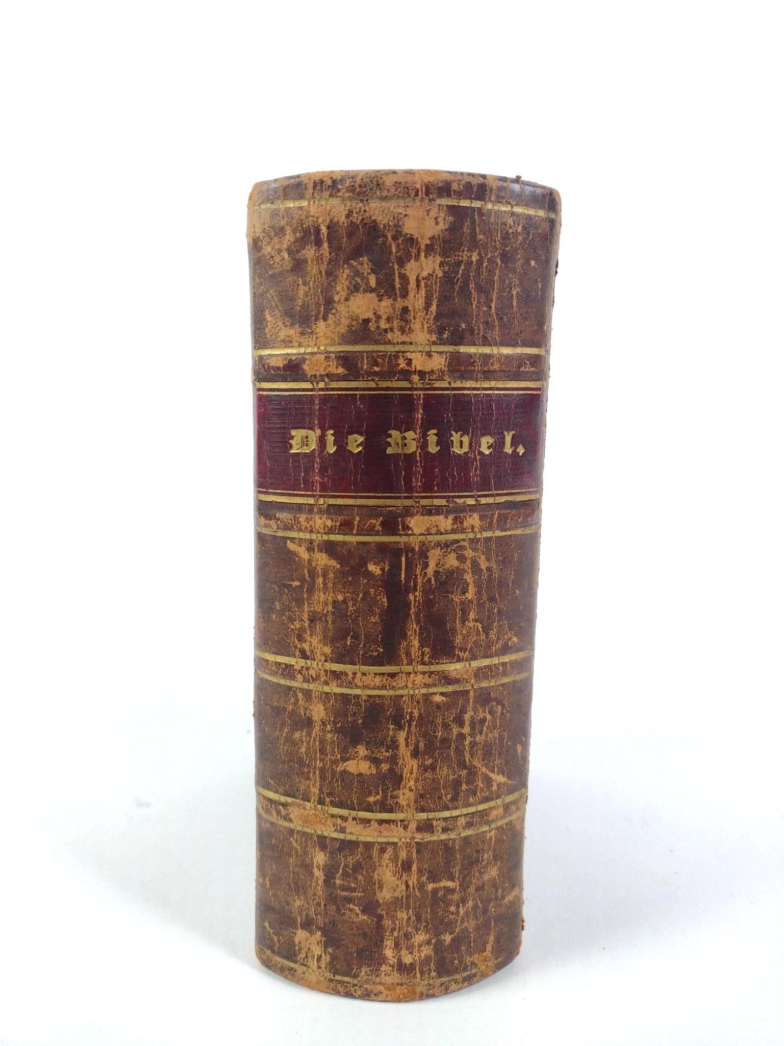 1847 Leather-Bound German Bible with Buckles: Die Bibel in good condition, consistent with age and use. Buckles still work. Measures 5-1/4" long x 2-3/4" wide x 7-1/2" high. 