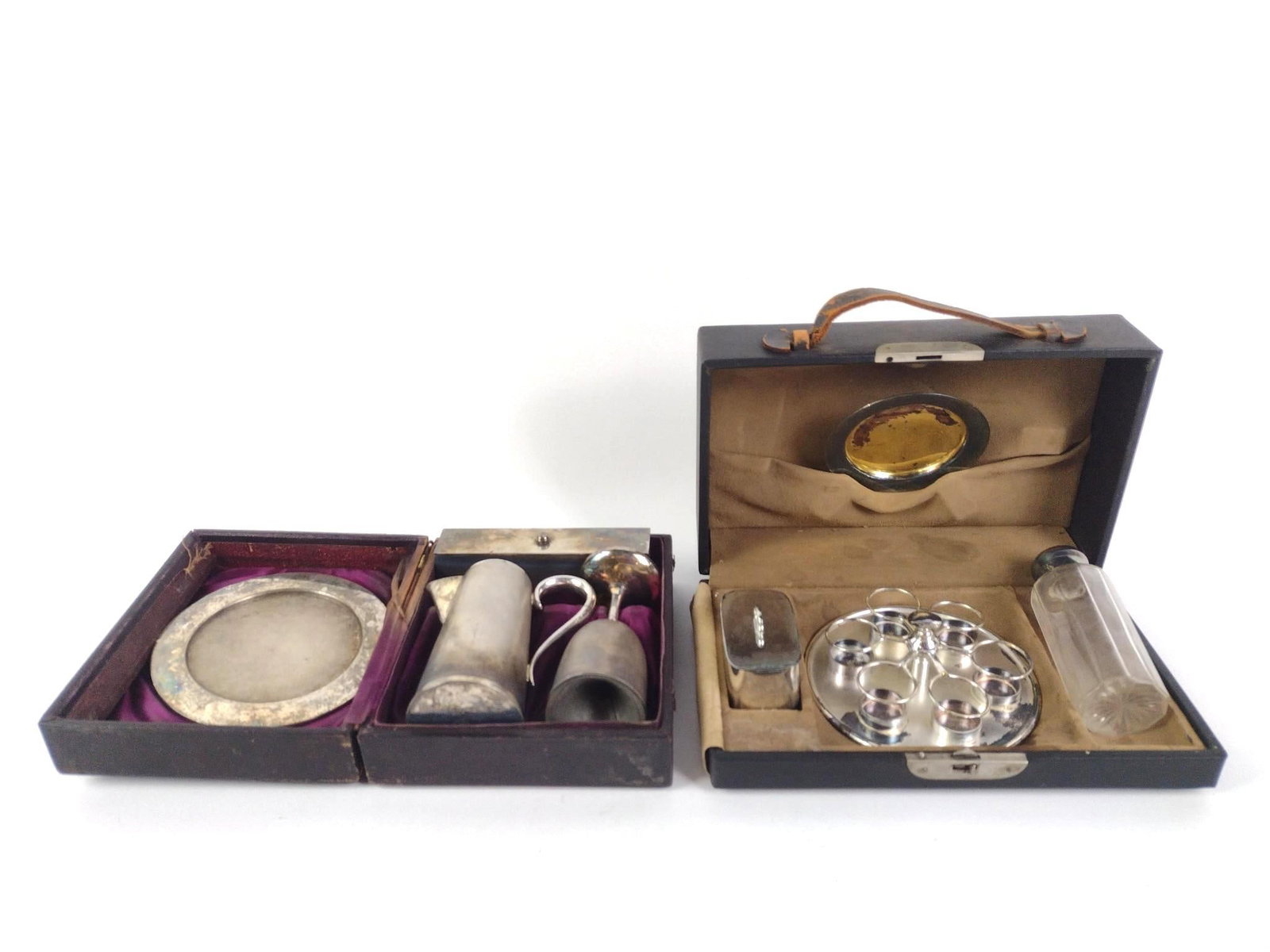2 Portable Victorian Communion Sets: 1.) Meriden Company Silver portable communion set measures 6-1/2" x 5-3/4" 2.) Westminster Press quadruple silver-plated portable communion set measures 9" x 5-1/2". Both are in condition