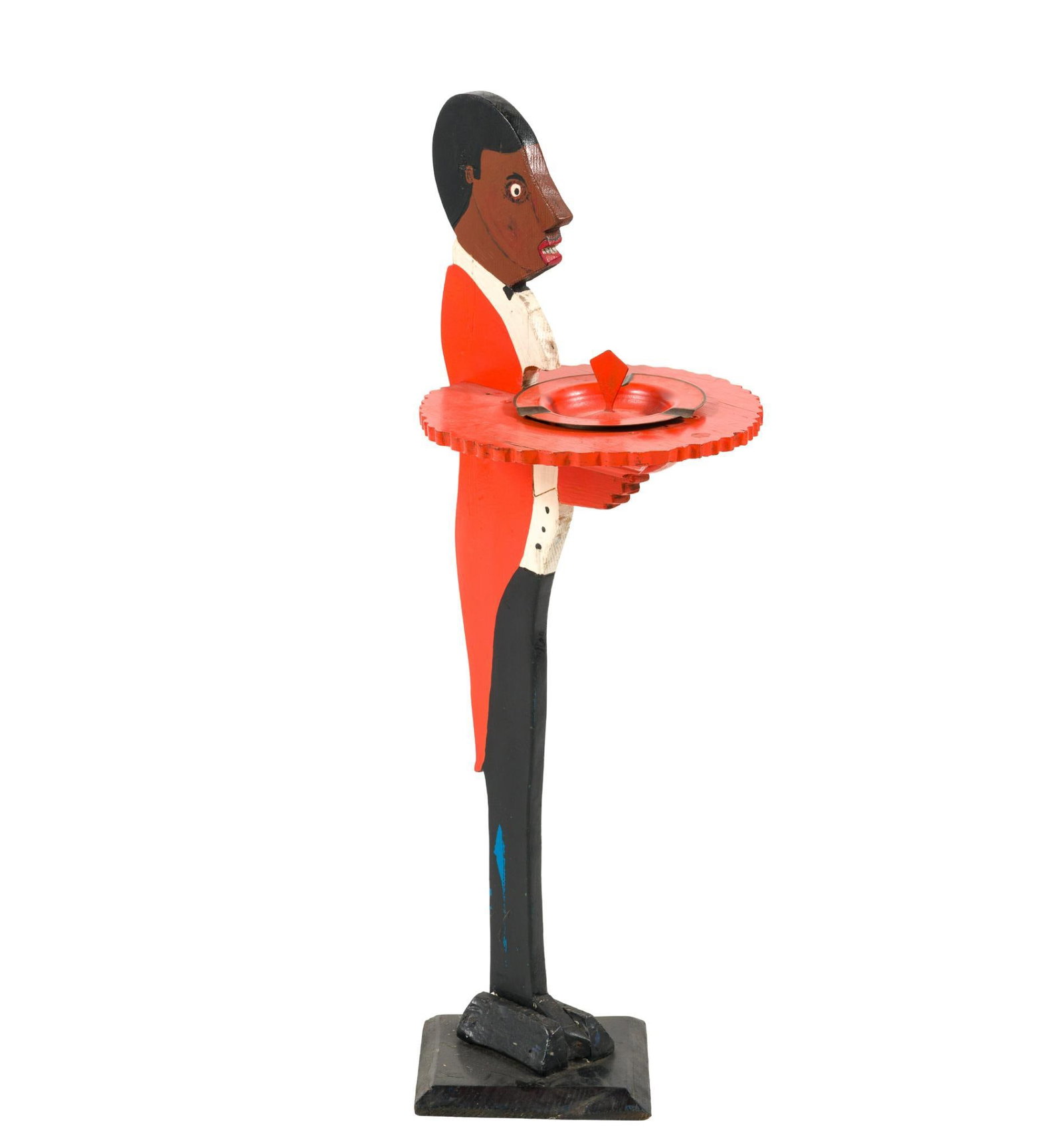Cutout Wood Silent Butler Smoking Stand: An African-American caricature smoking stand consisting of a cut out profile of a black man in waiter's livery holding a tray. On the tray is an inset ashtray. Probably 1940s, American. Wear