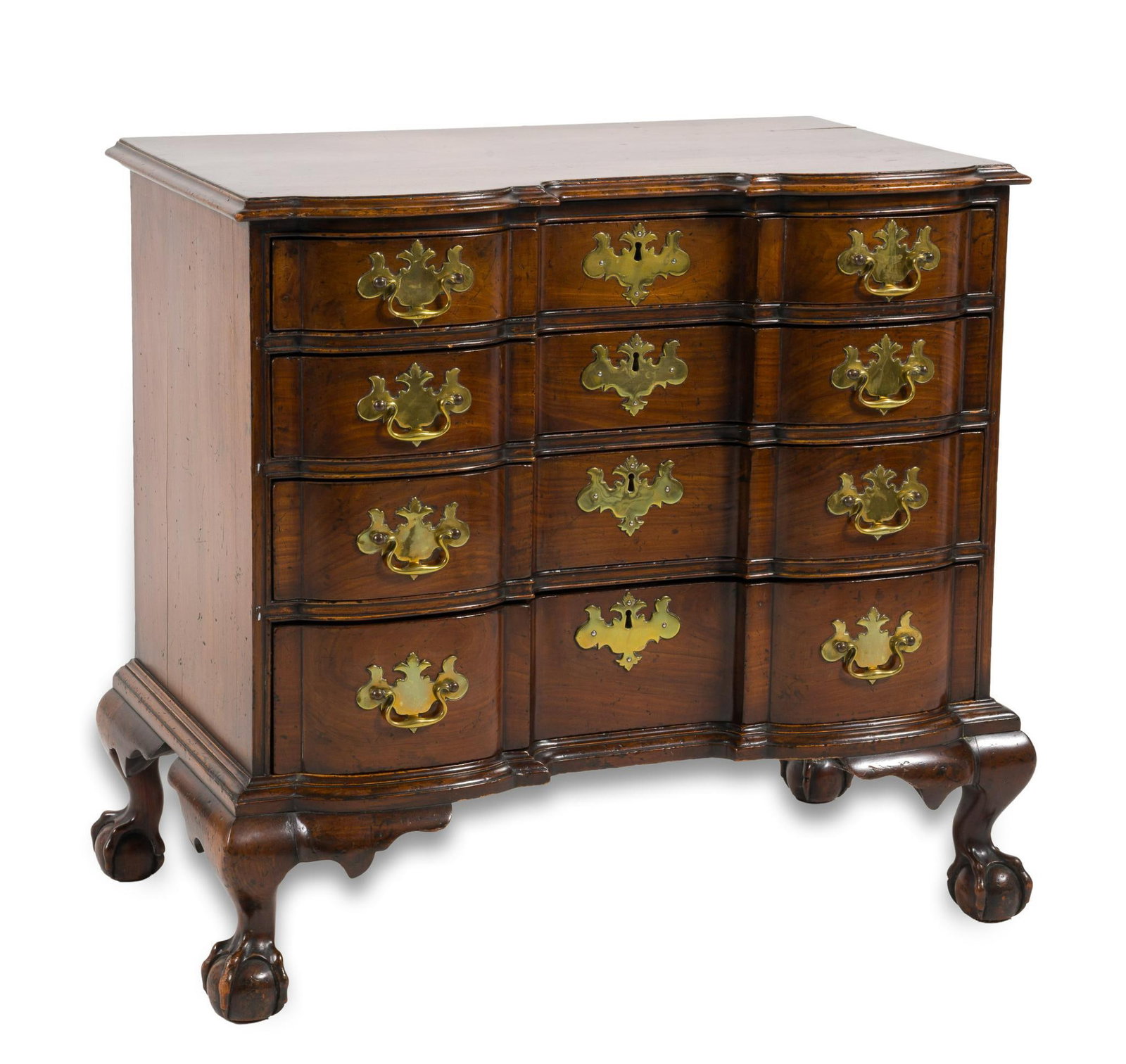 Chippendale Boston Block Front Chest of Drawers: A superb Boston mahogany block front chest of drawers circa 1770-80 of the highest quality. The form consisting of four ball and claw foot feet supporting a curved case with block front carved case