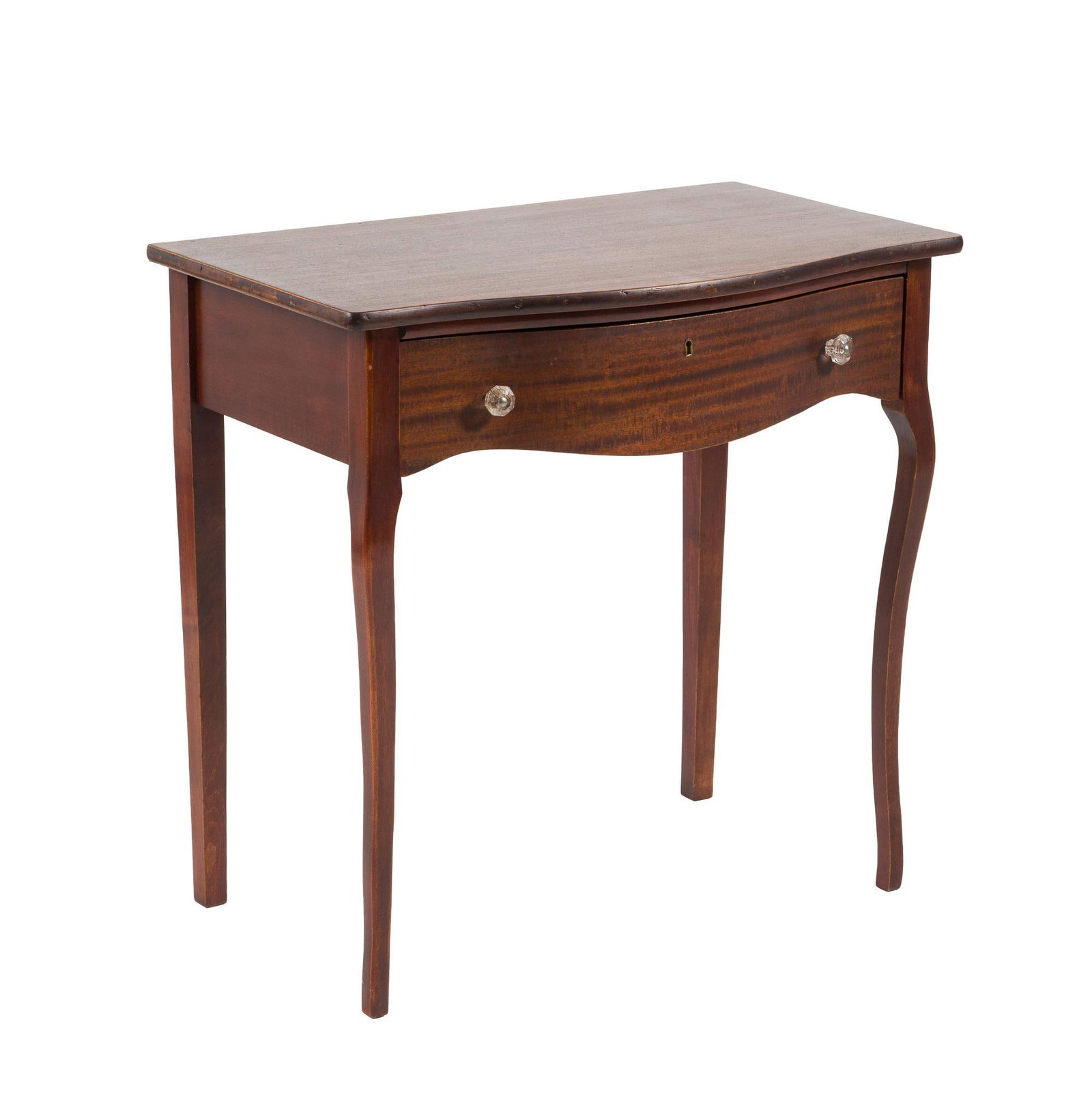 French Revival Side Table: Twentieth century satinwood and other woods bowfront table with cabriole legs. Single drawer with original glass knobs. Trace remains of old maker's label. Wear consistent with age. 31" x 32" x 20"