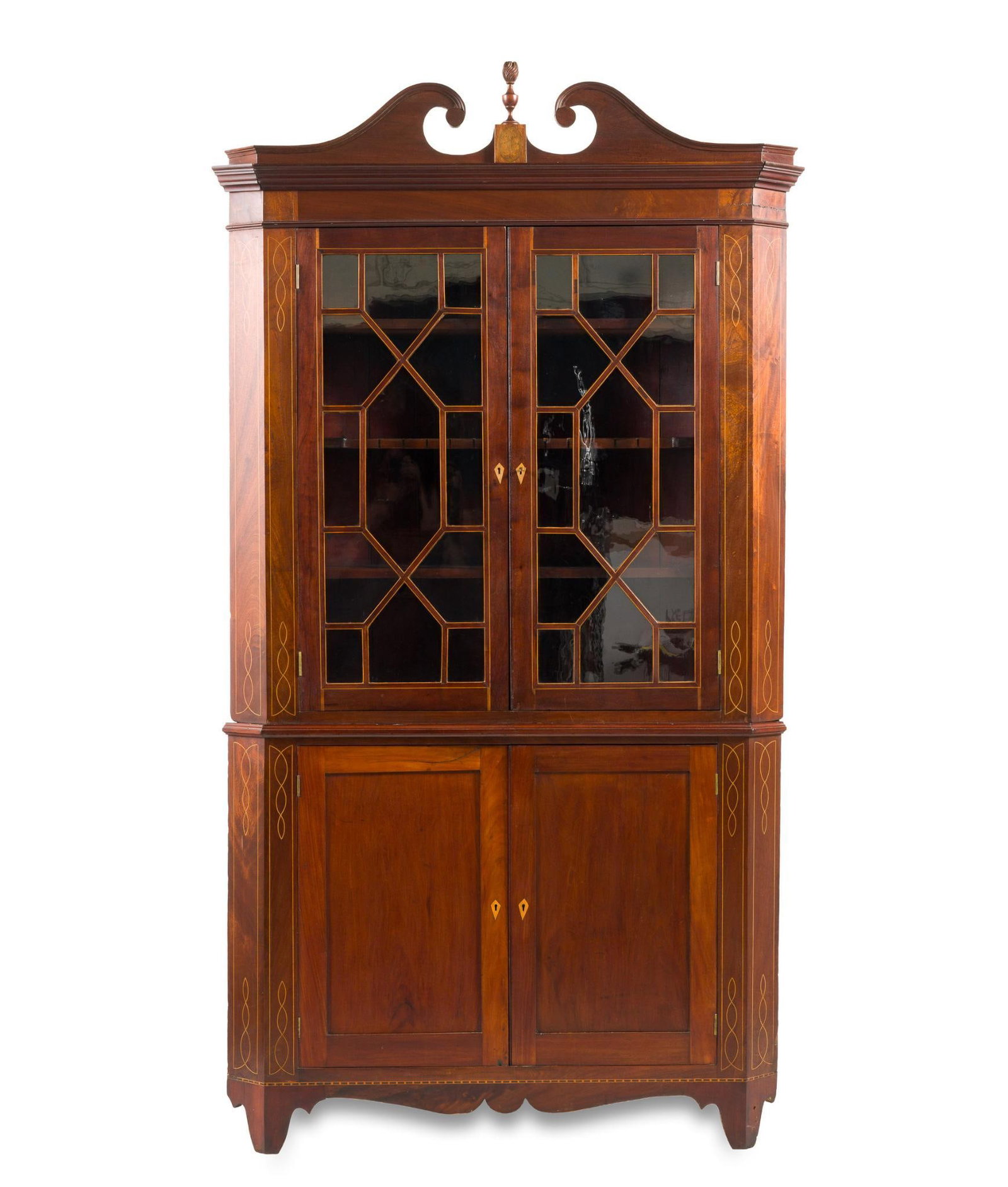 American Federal Corner Cupboard: A Hepplewhite Federal two piece corner cupboard, circa 1800, probably mid-Atlantic. Of typical form consisting of a double blind door base surmounted by a double glazed door top with swans neck