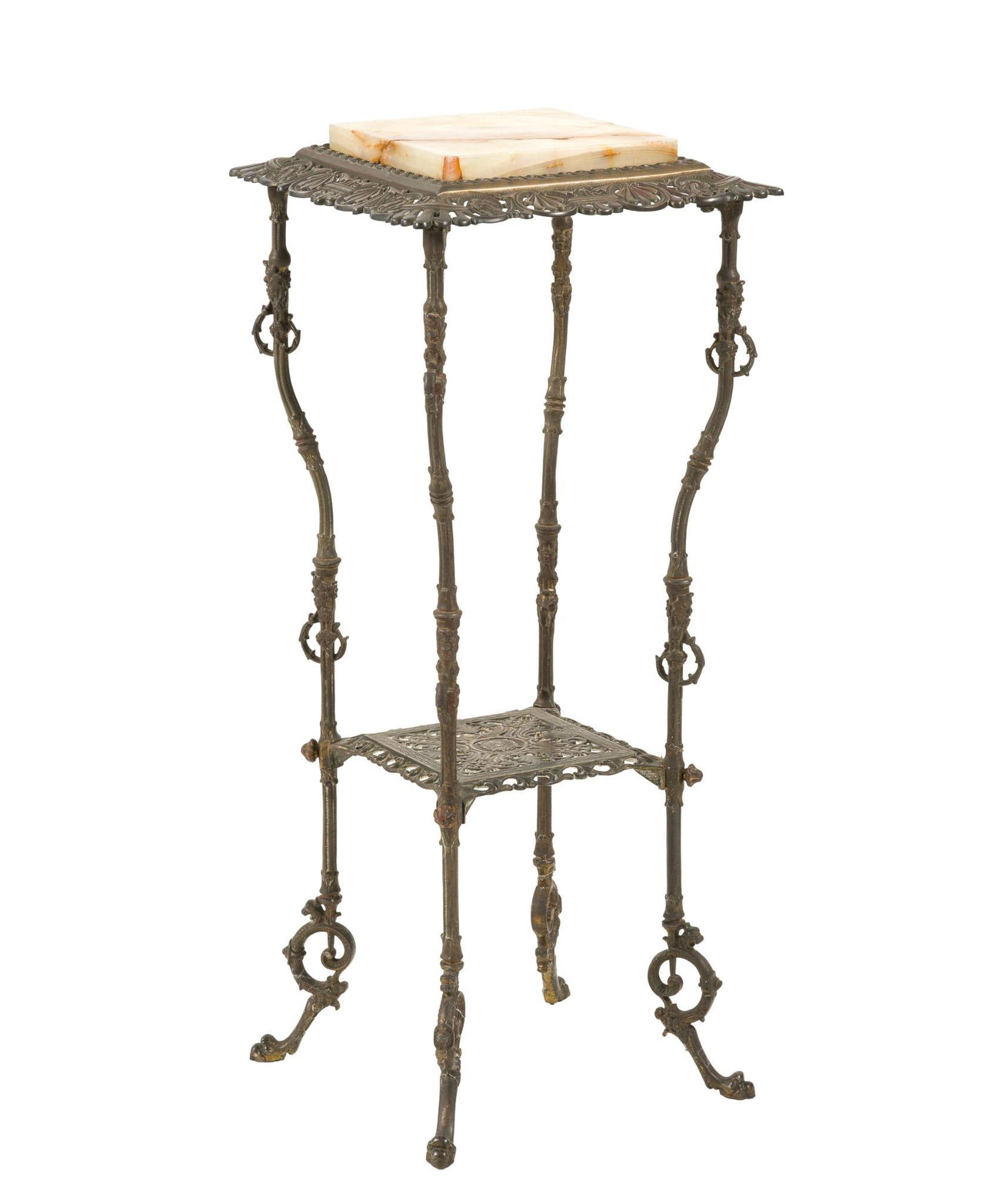 Edwardian Brass and Alabaster Stand: A cast brass two tier Edwardian fern stand circa 1910. The delicate scrolled legs supporting a lower metal shelf and a larger top with inset alabaster plaque. Wear consistent with age. 31" x 13" x 13"