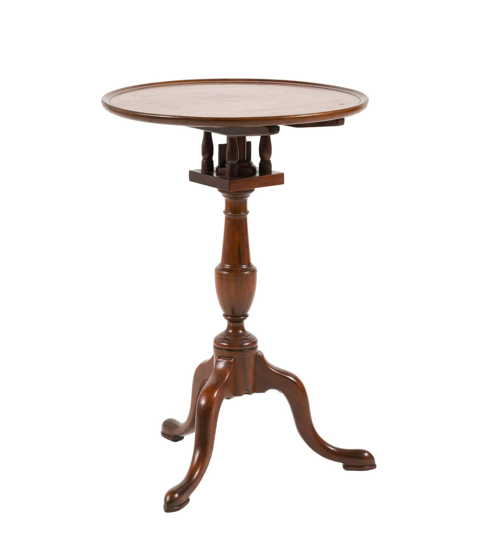 Pennsylvania Chippendale Kettle Stand: A very fine late Chippendale mahogany kettle stand circa 1780 probably southeastern Pennsylvania. The form consisting of three snake or slipper feet supporting a classical turned shaft in the shape