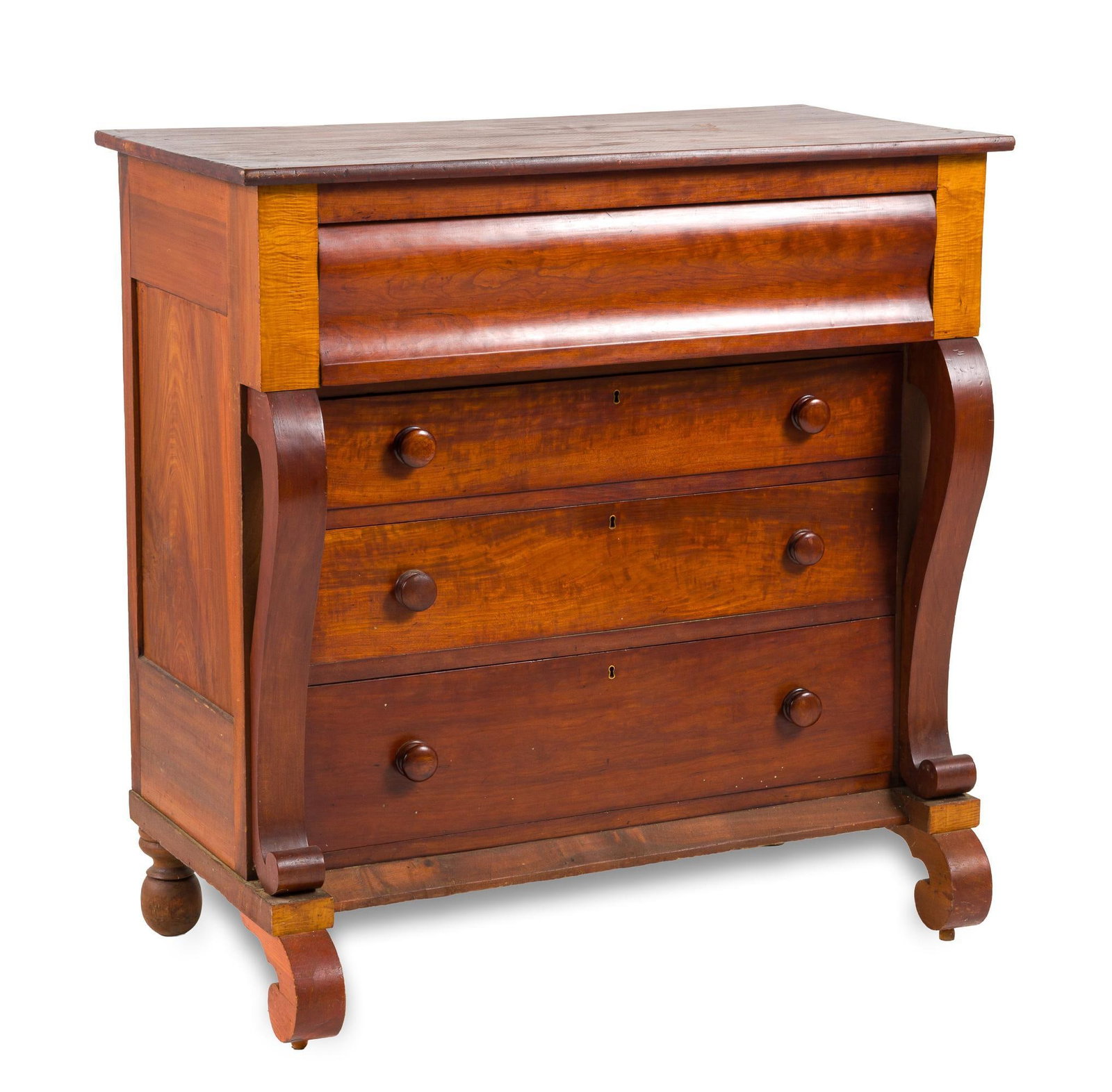 American Empire Chest of Drawers: An American Empire, pillar and scroll style,chest of drawers probably south central Pennsylvania. Mahogany veneers over a pine case. Front scroll feet and rear ball feet typical of PA work. Three grad