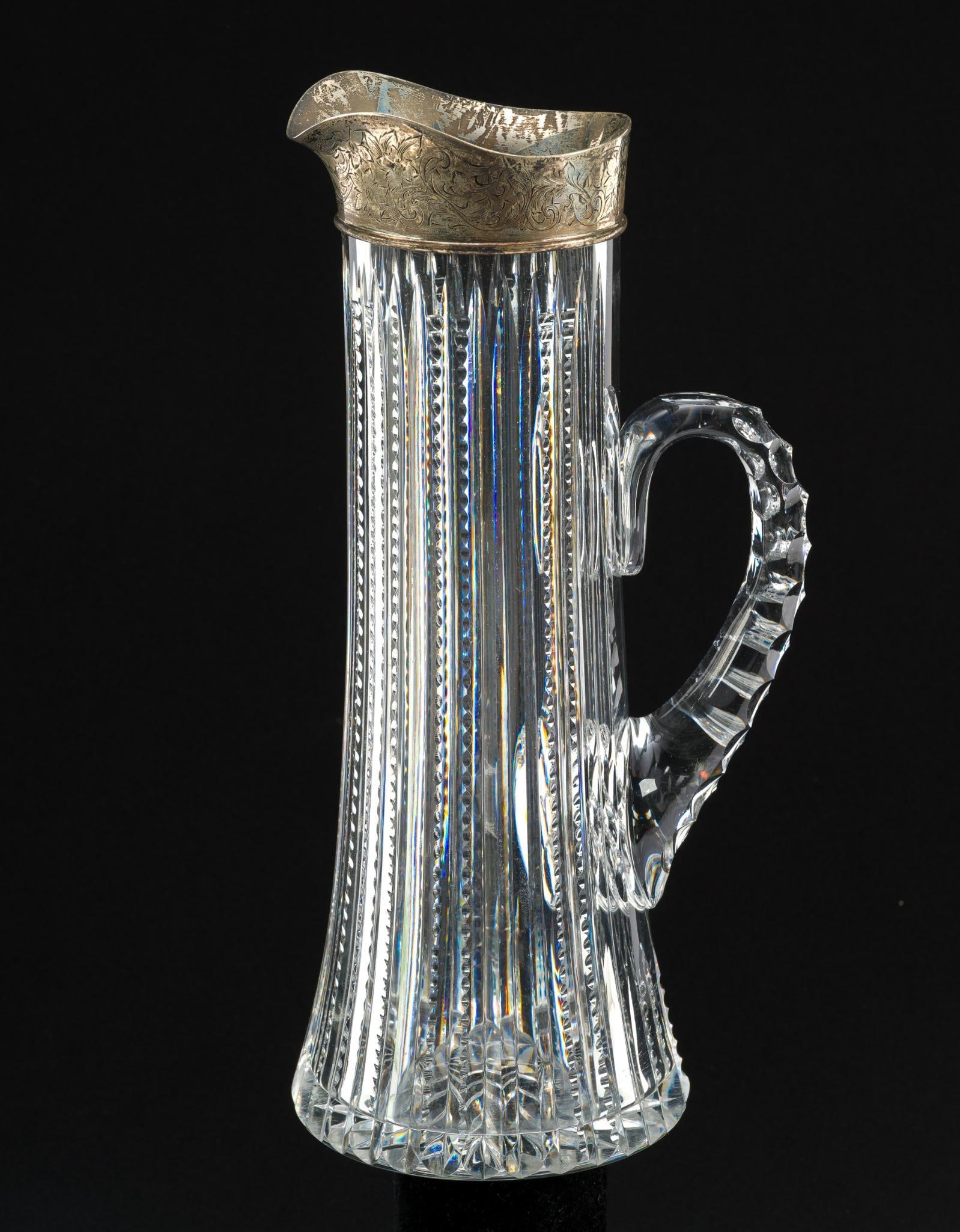 Sterling Silver & Cut Glass Water Pitcher: Top marked sterling. 4-1/2" wide x 11-3/4" long. 